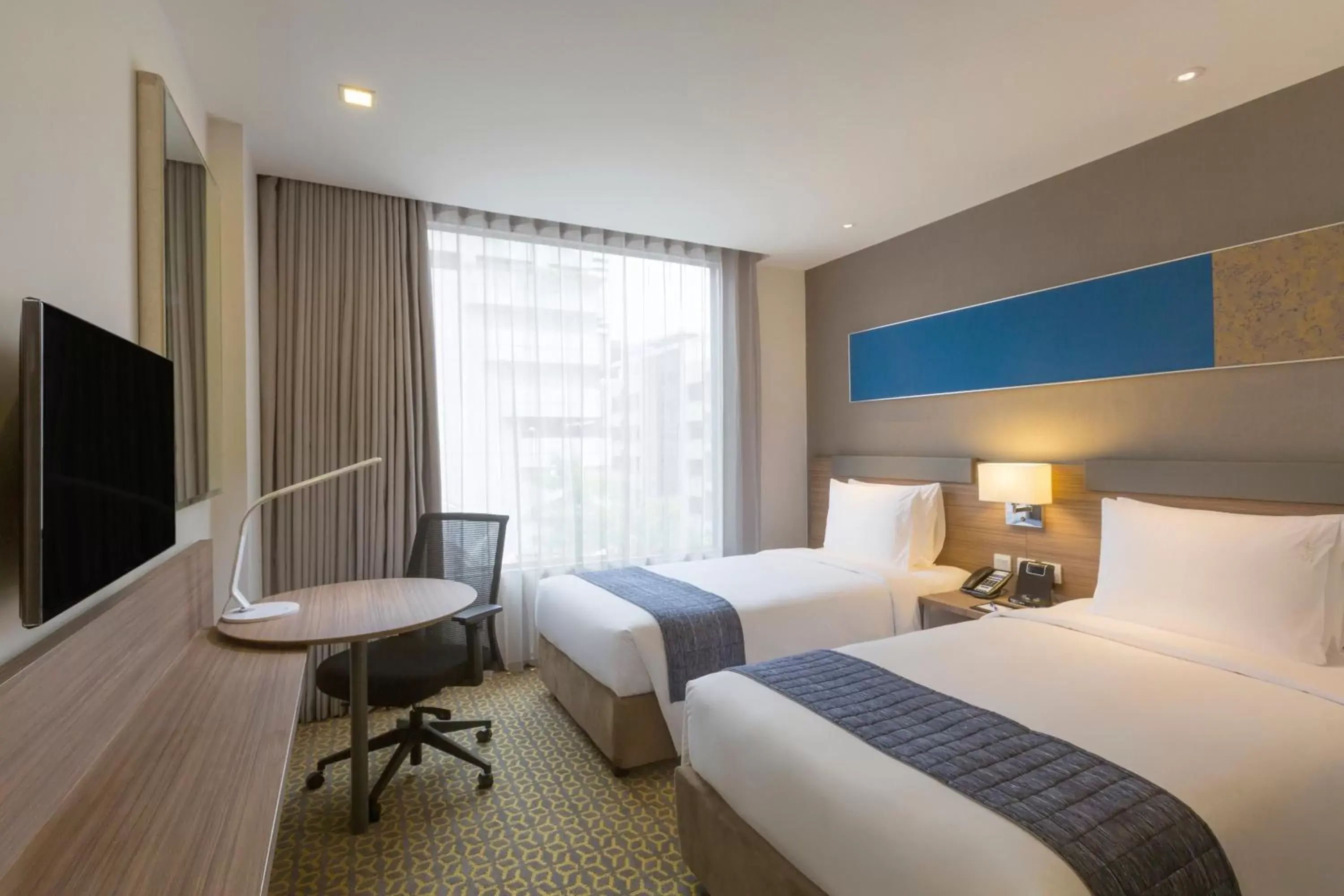 Photo of the whole room, Bed in Holiday Inn Express Bangkok Sathorn, an IHG Hotel