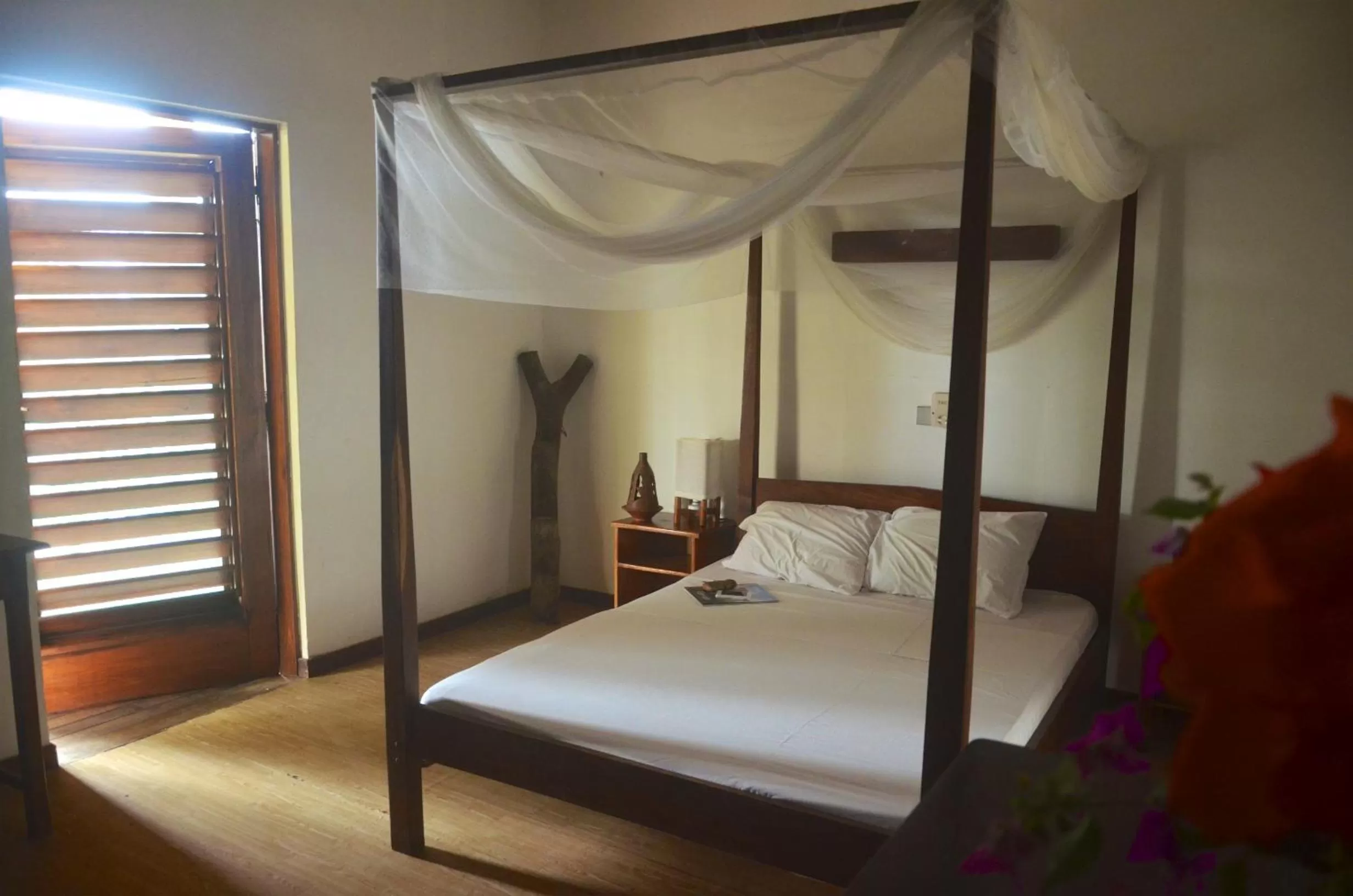 Bed, Room Photo in Auberge de Grand Popo