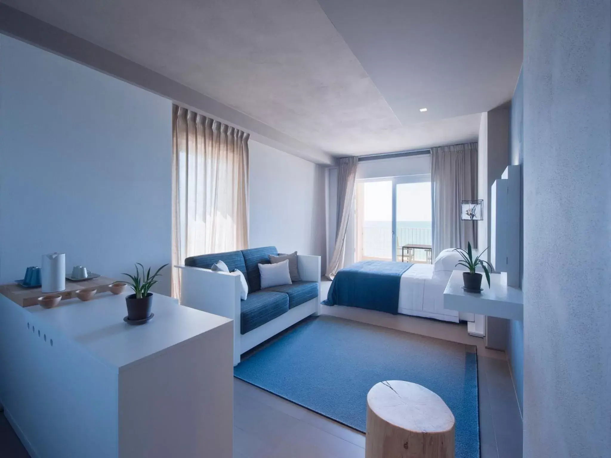 Bed, Seating Area in Il Fogliano Hotel