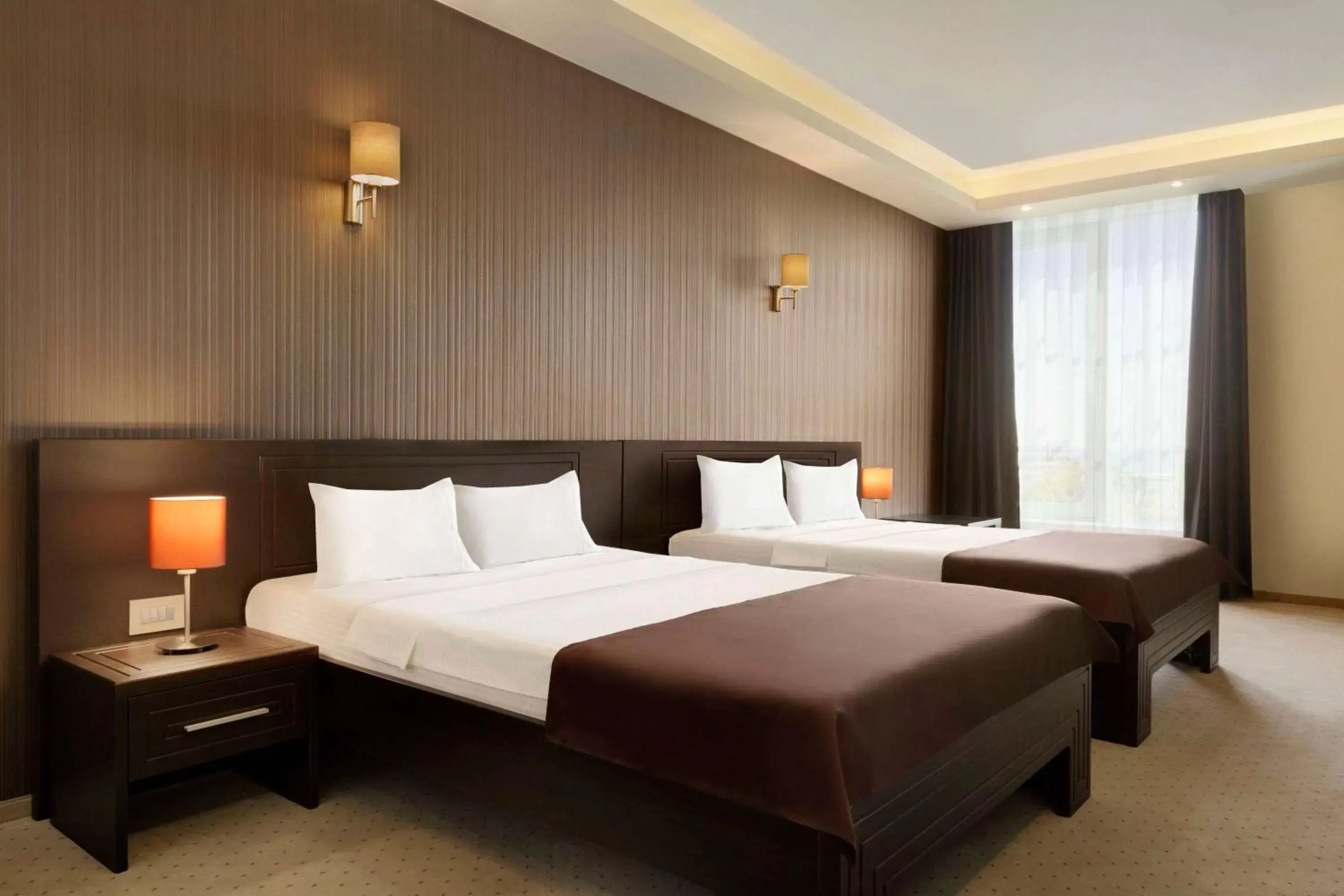 Photo of the whole room, Bed in Ramada by Wyndham Constanta