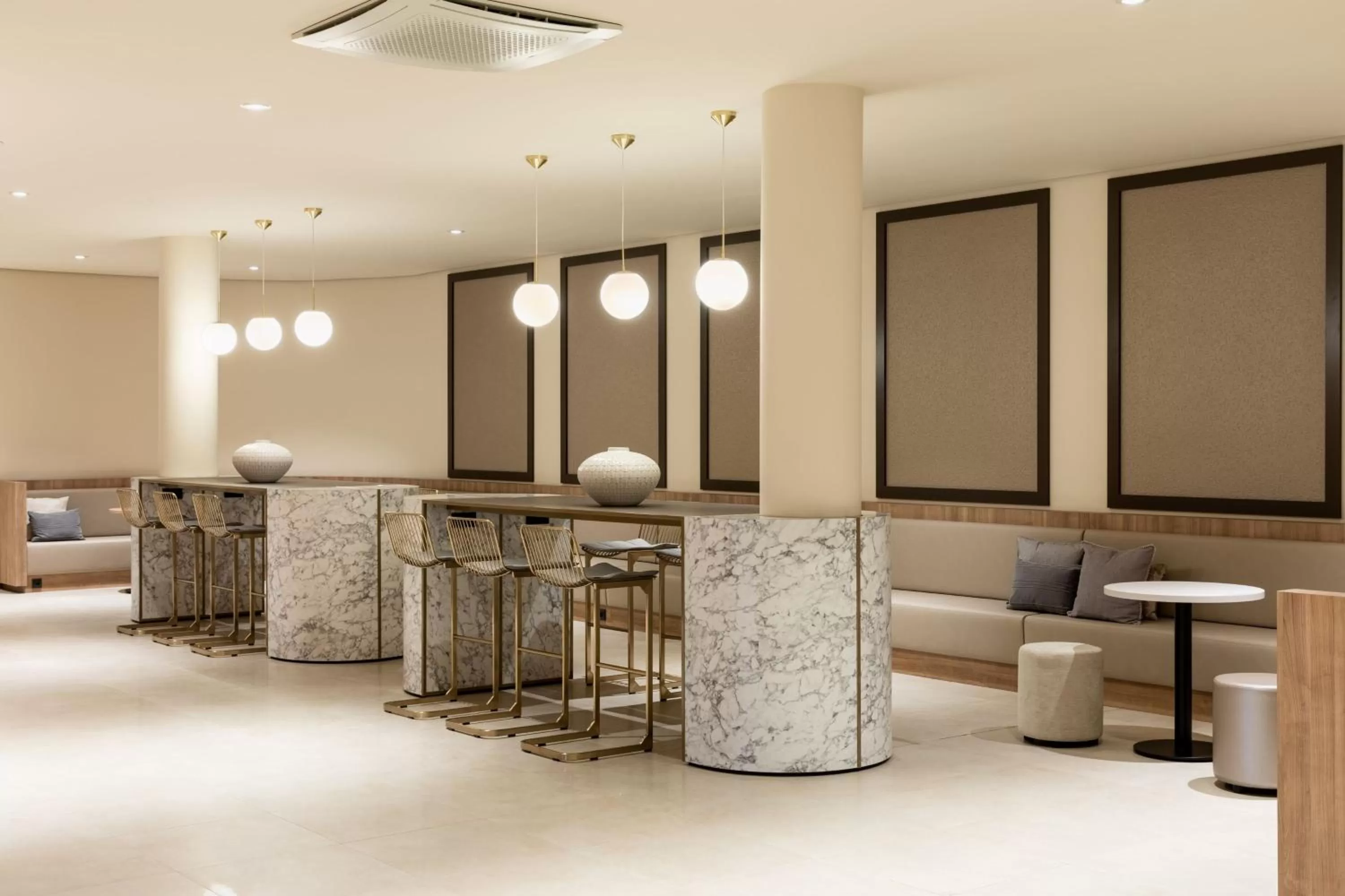 Lobby or reception in AC Hotel by Marriott Wuerzburg