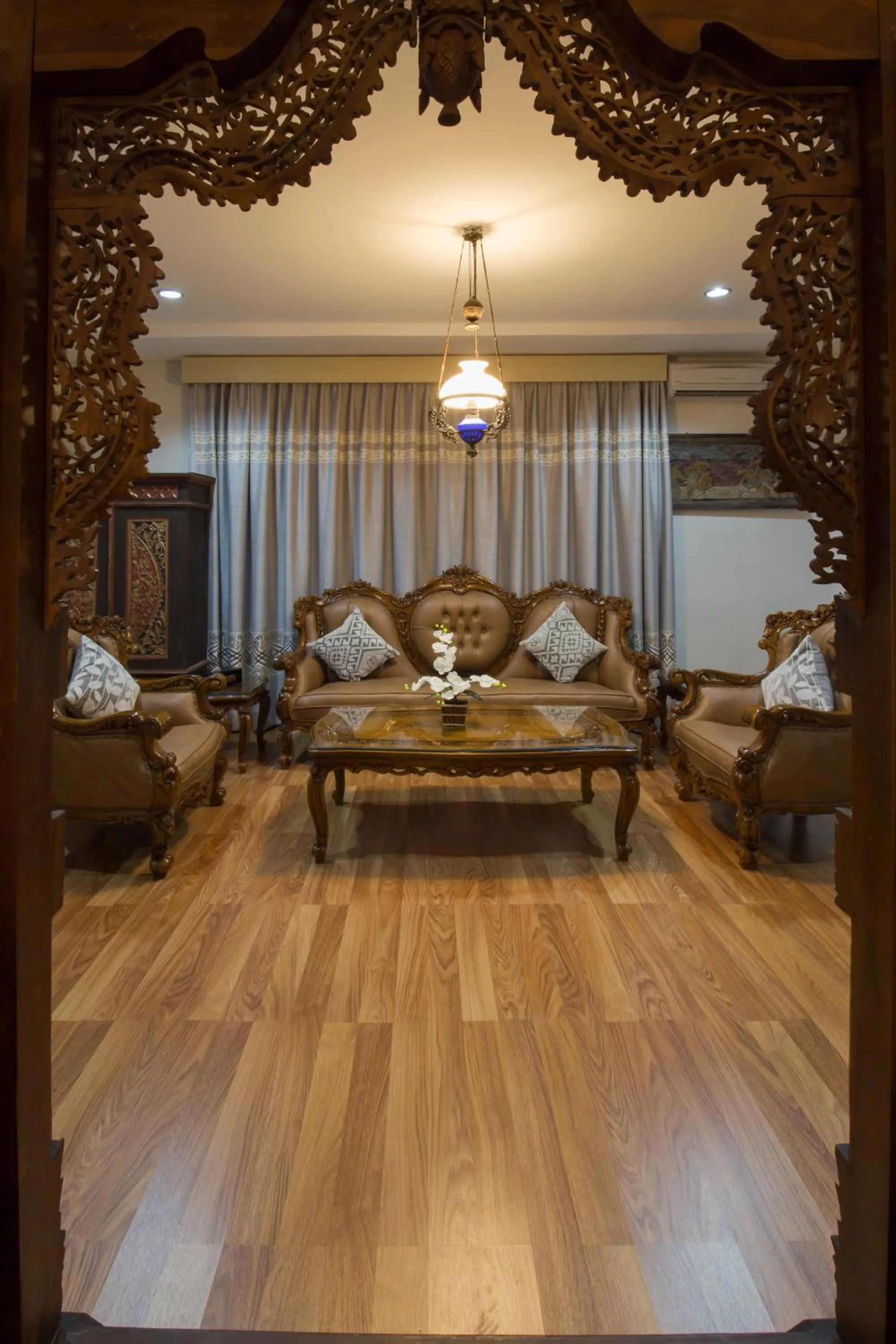 Living room in Grand Puri Saron Hotel Yogyakarta