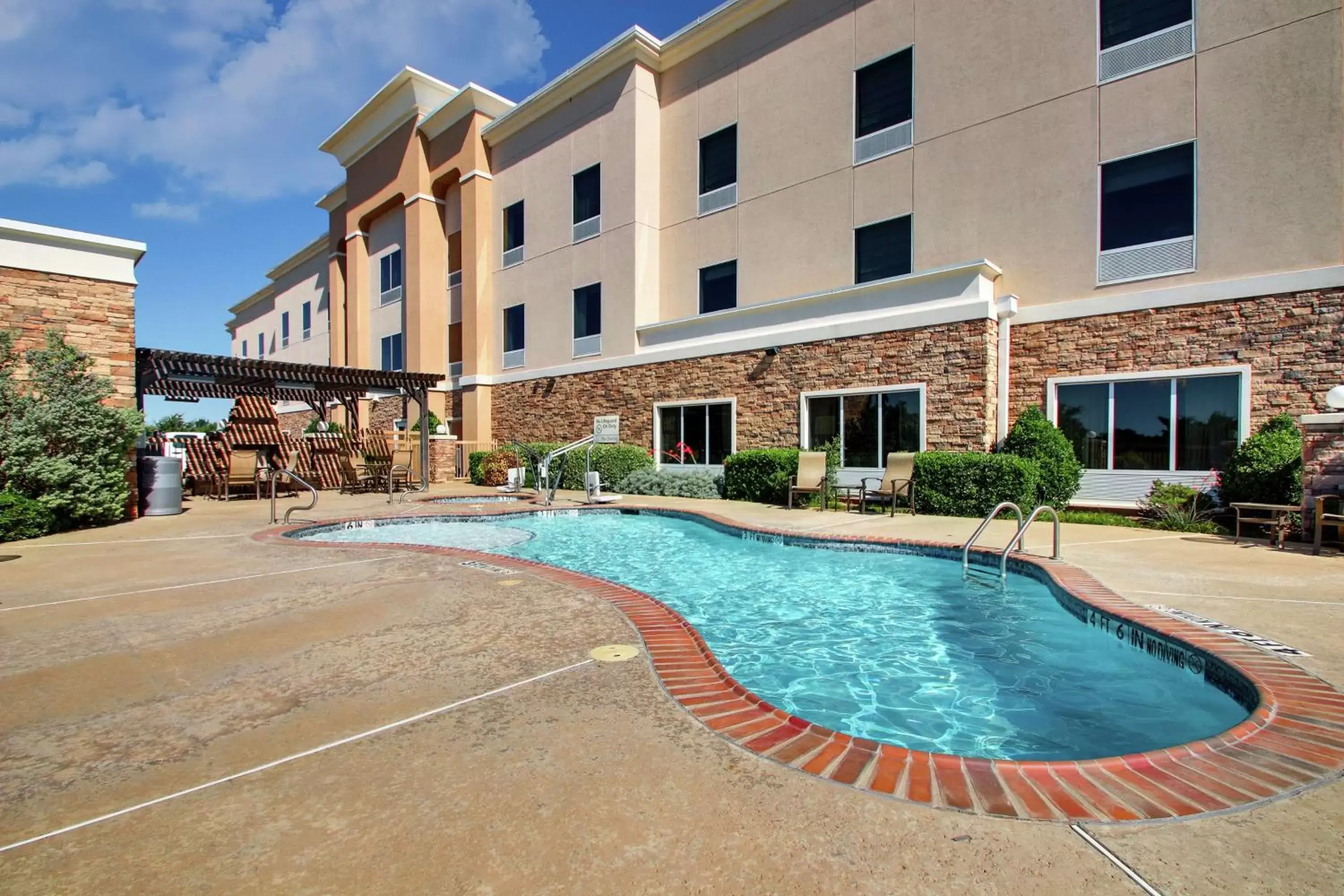 Pool view, Property Building in Hampton Inn Vernon