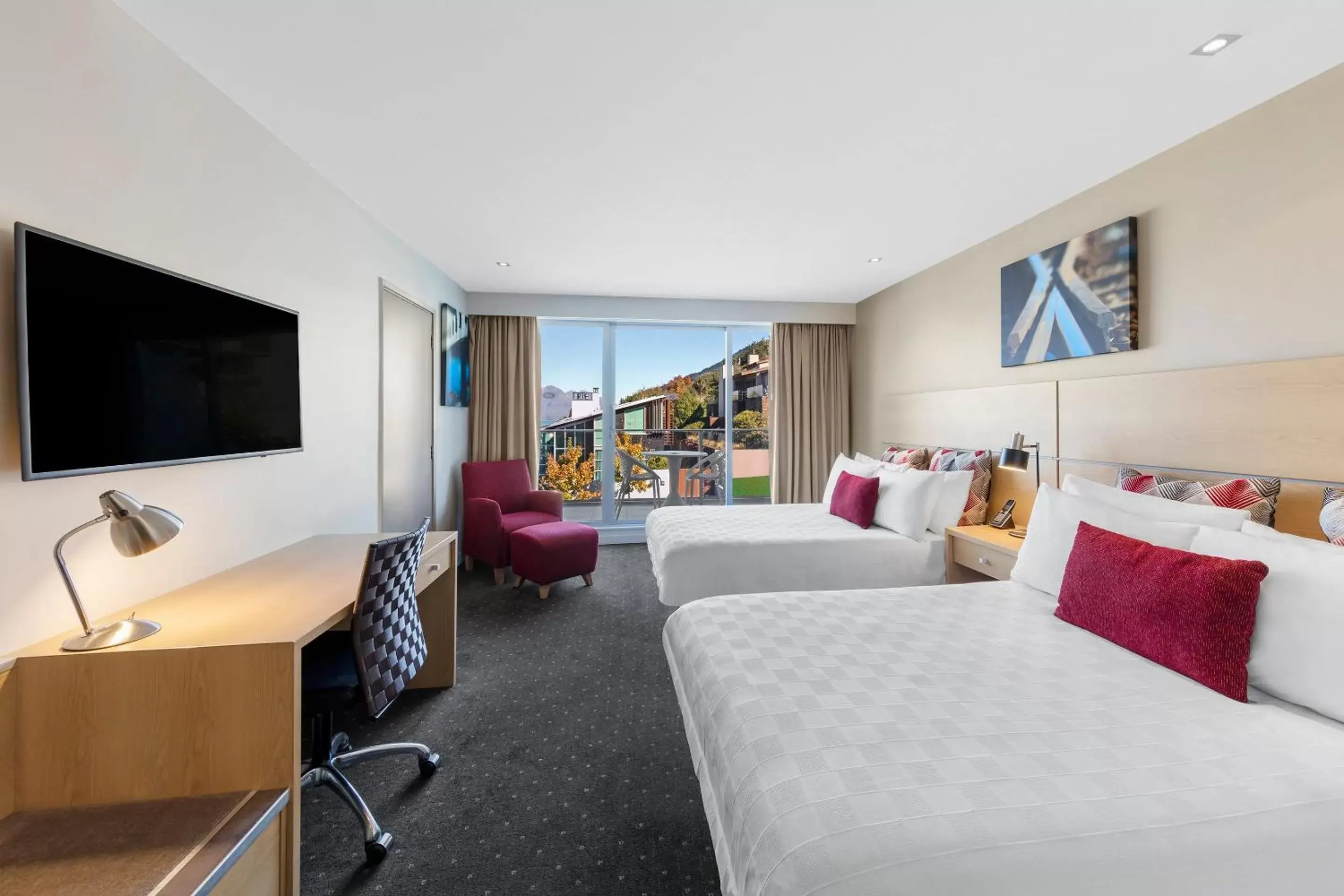 Photo of the whole room, TV/Entertainment Center in Crowne Plaza Queenstown, an IHG Hotel