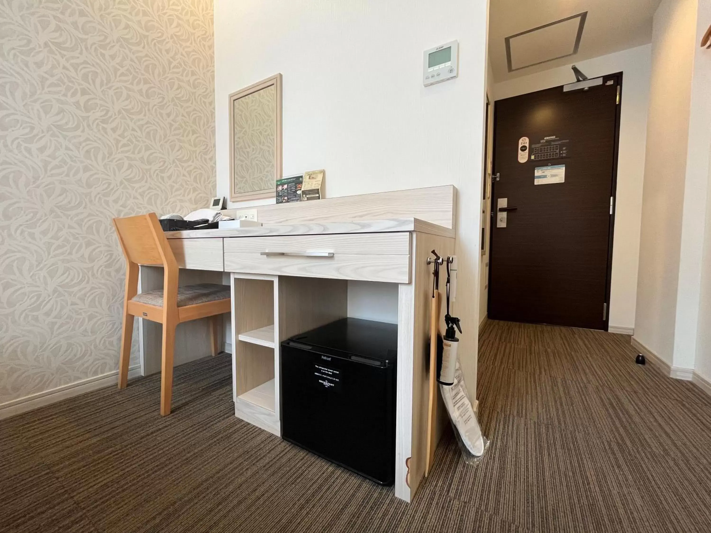 Photo of the whole room, TV/Entertainment Center in The BREAKFAST HOTEL Fukuoka Tenjin