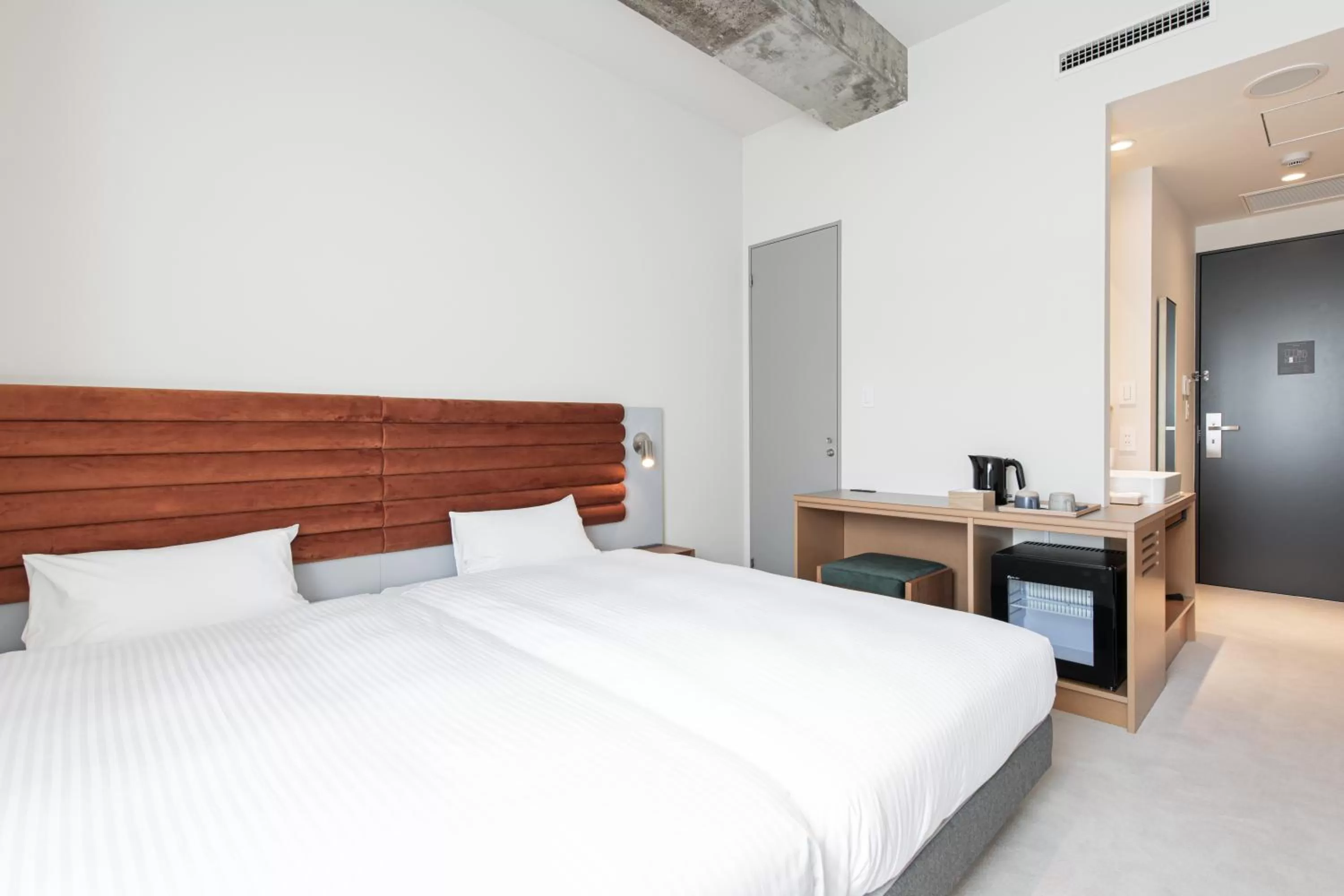 Bed in KIRO Hiroshima by THE SHARE HOTELS