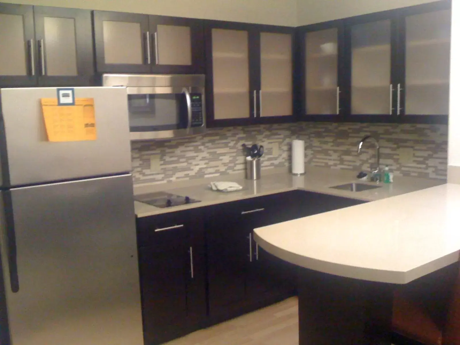 Kitchen or kitchenette, Kitchen/Kitchenette in Staybridge Suites Houston Stafford - Sugar Land, an IHG Hotel