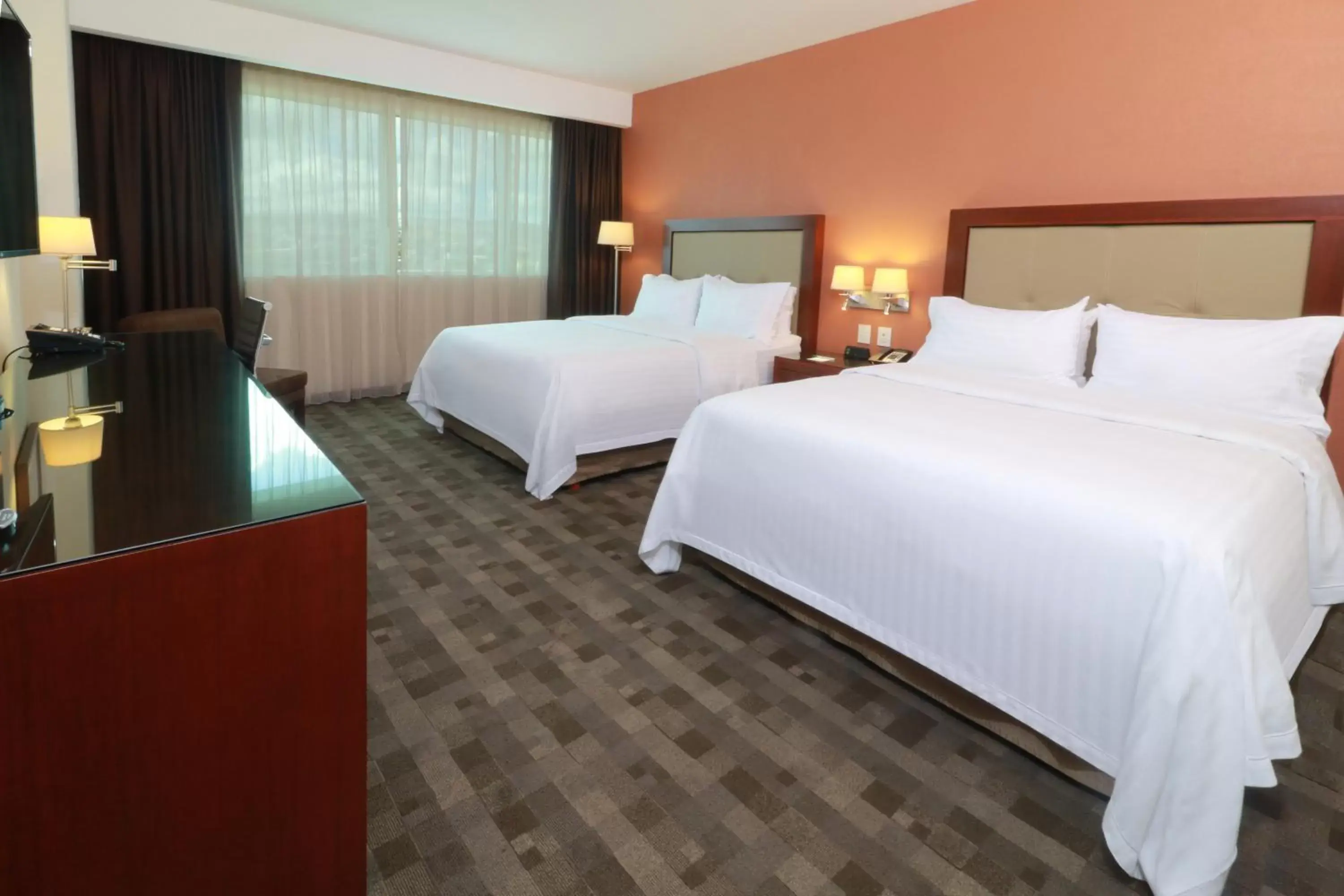 Photo of the whole room, Bed in Holiday Inn & Suites Plaza Mayor, an IHG Hotel