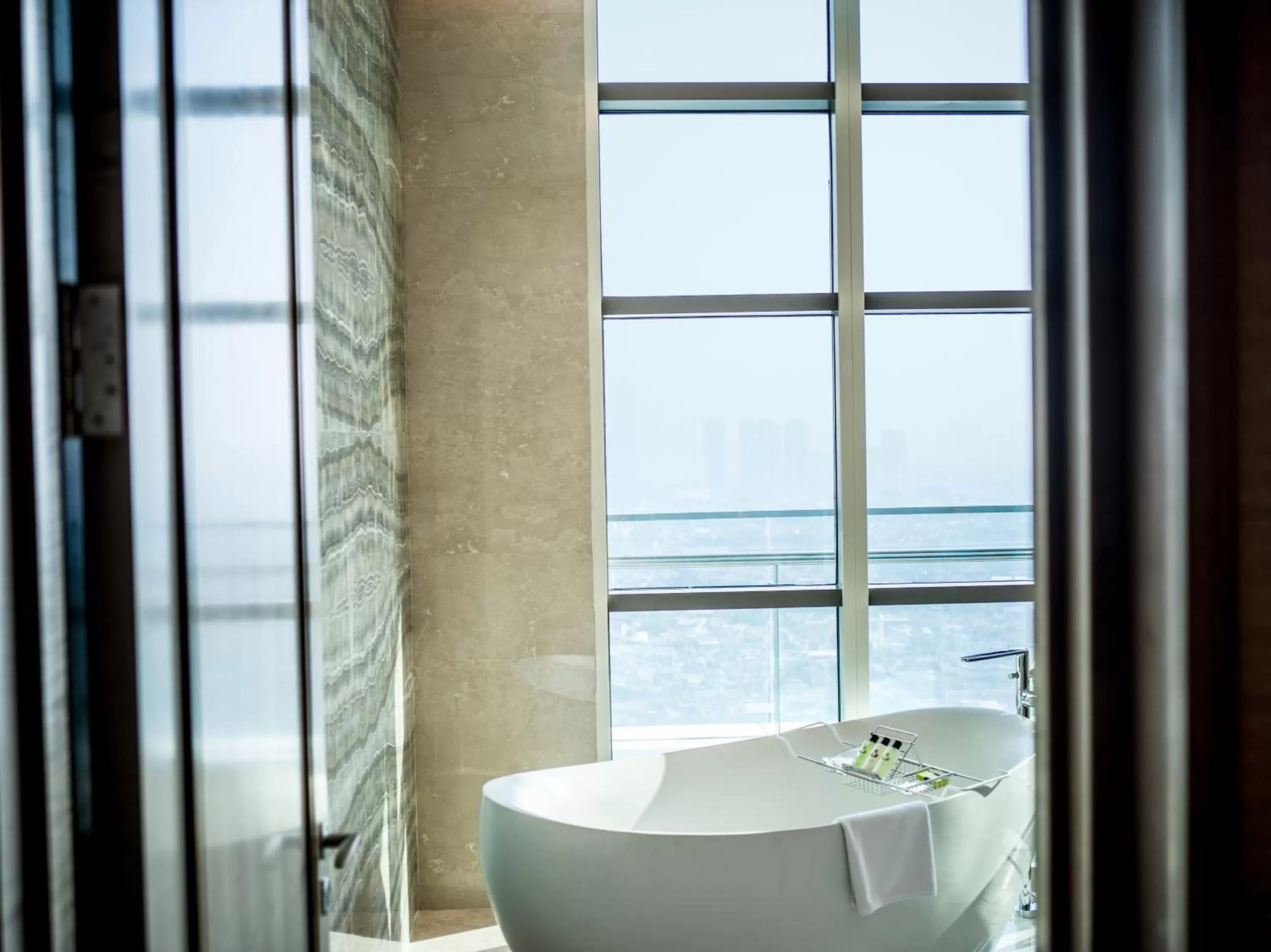 Bathroom in InterContinental Hotels Jakarta Pondok Indah by IHG