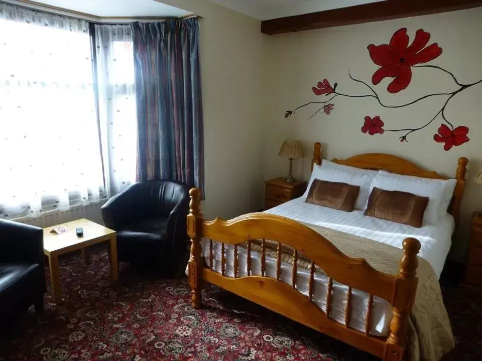 Photo of the whole room, Bed in Woodlands Hotel