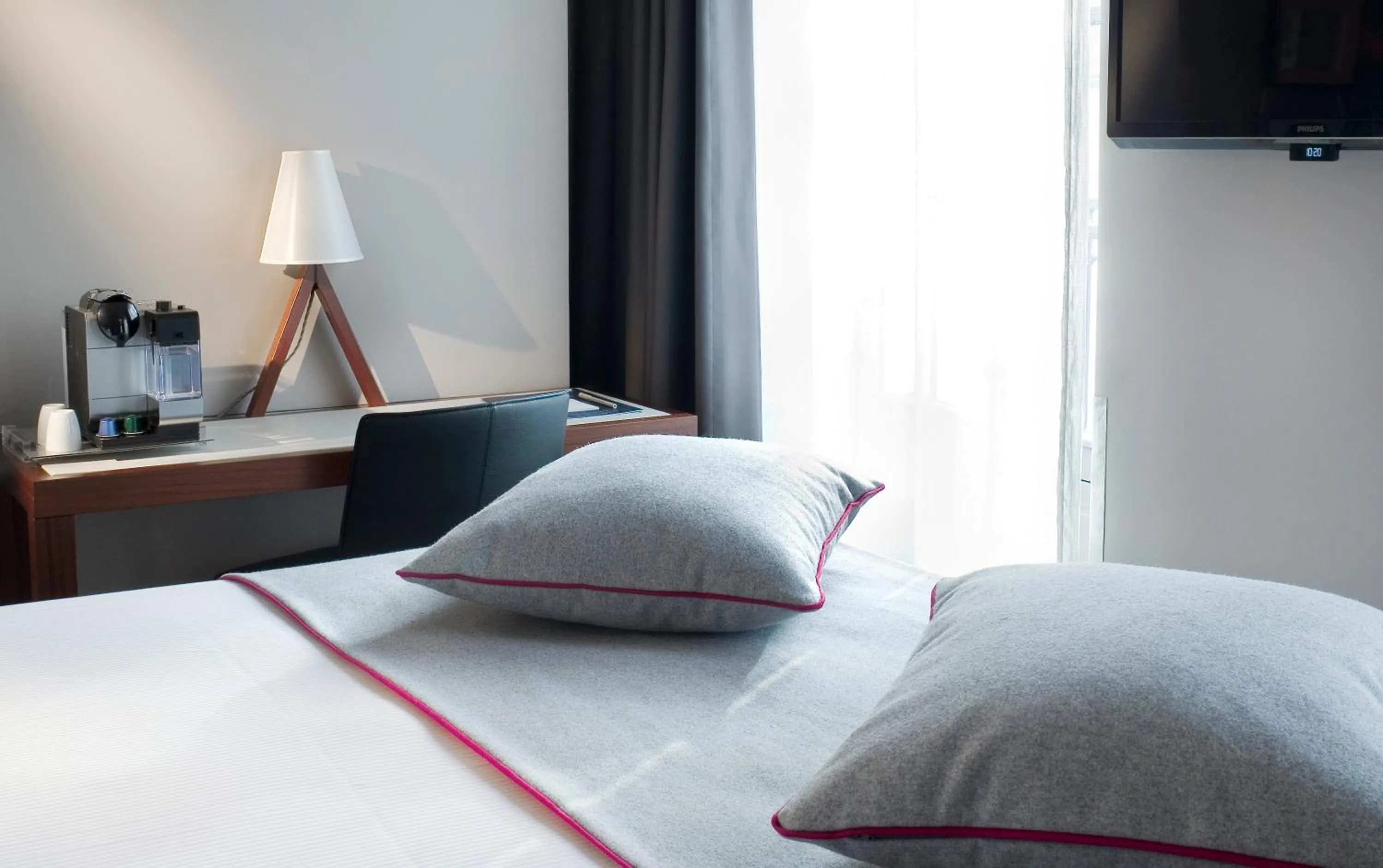 Bed in Hotel Saint Dominique