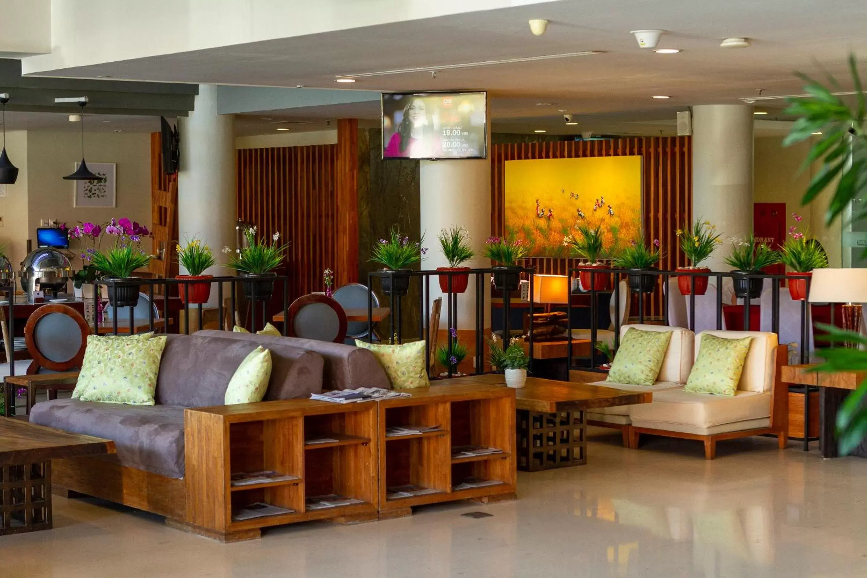 Lounge or bar, Lobby/Reception in PrimeBiz Hotel Kuta