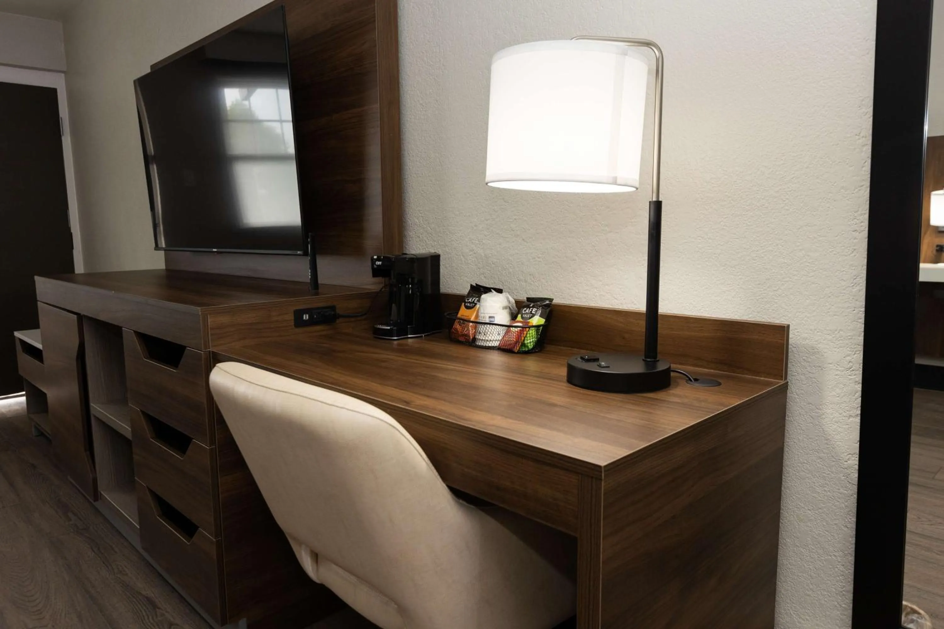 Bedroom in Bhagat Hotels Stone Mountain Atlanta BW Signature Collection