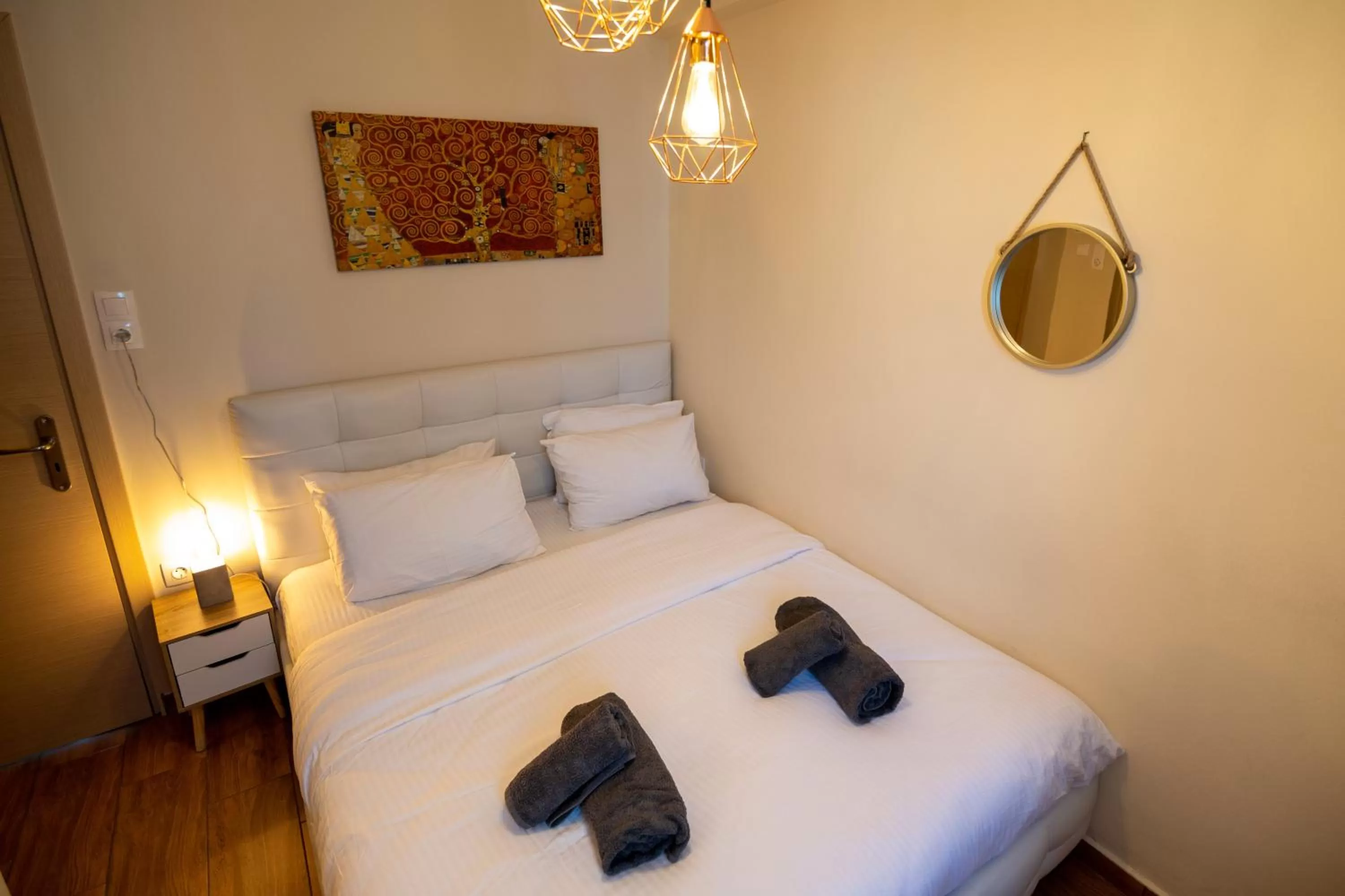 Bed in Votsalakia Hotel & Luxury Apartments