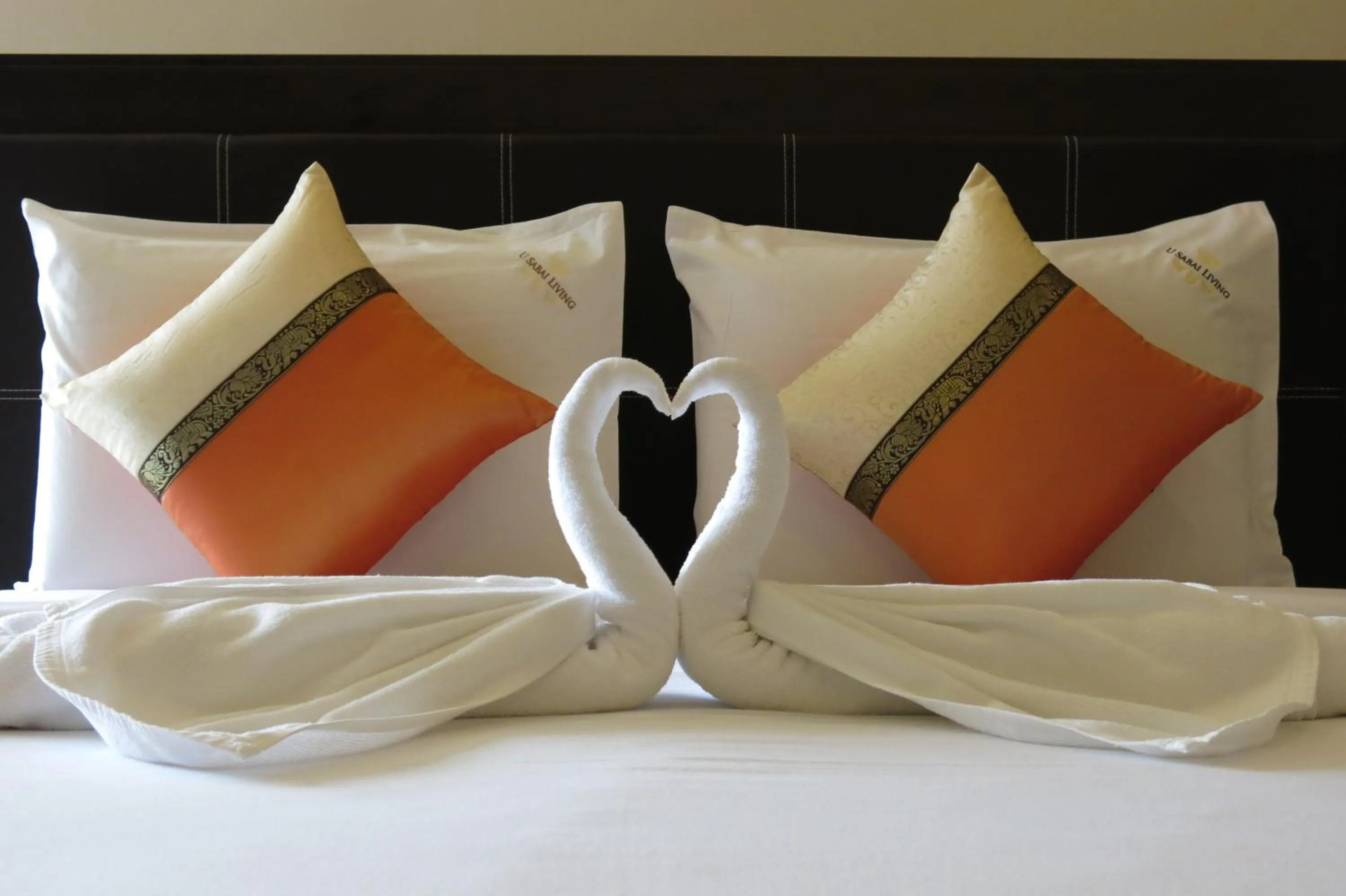 Bed in U Sabai Living Hotel