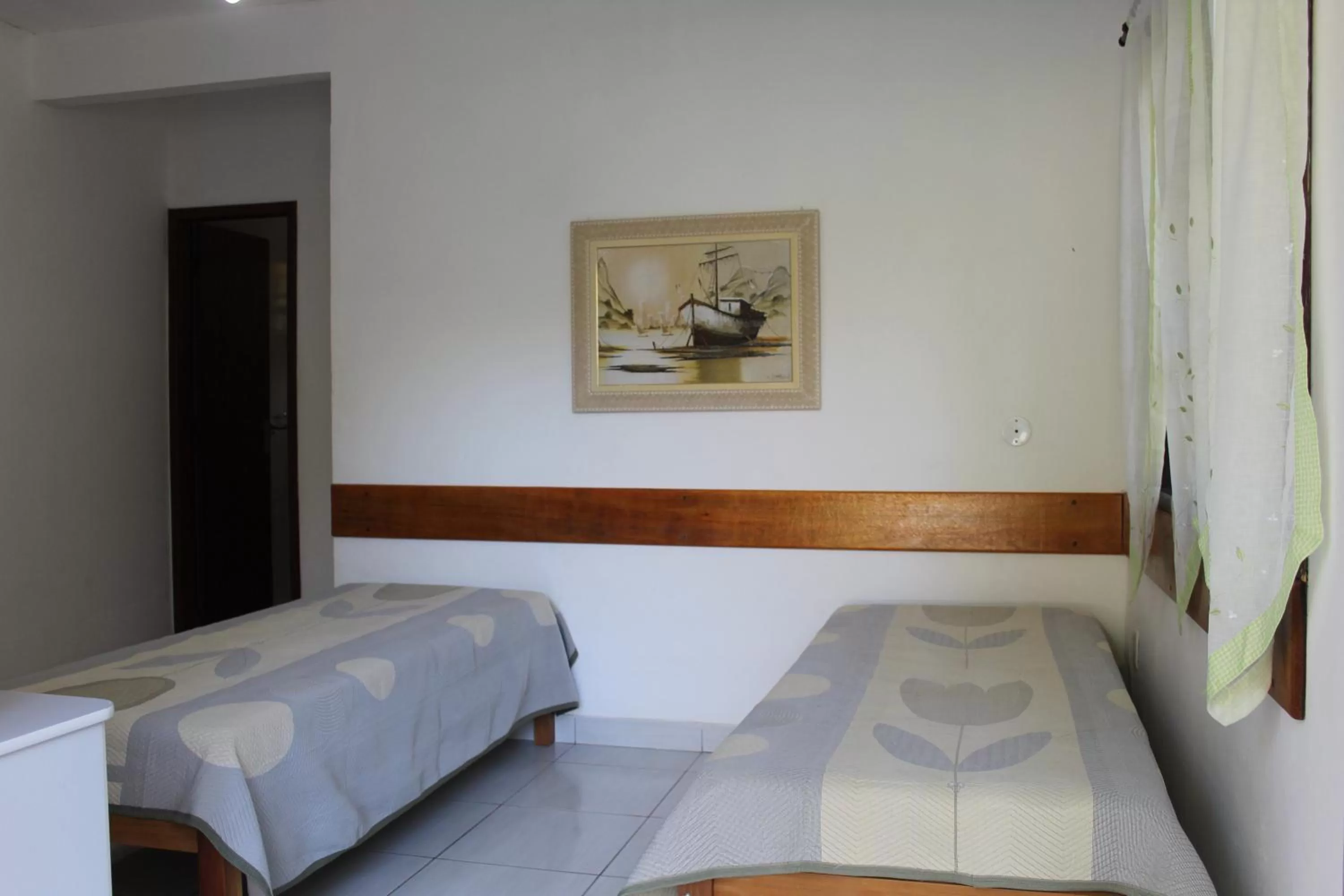 Bed in Pousada Recanto Das Emerências