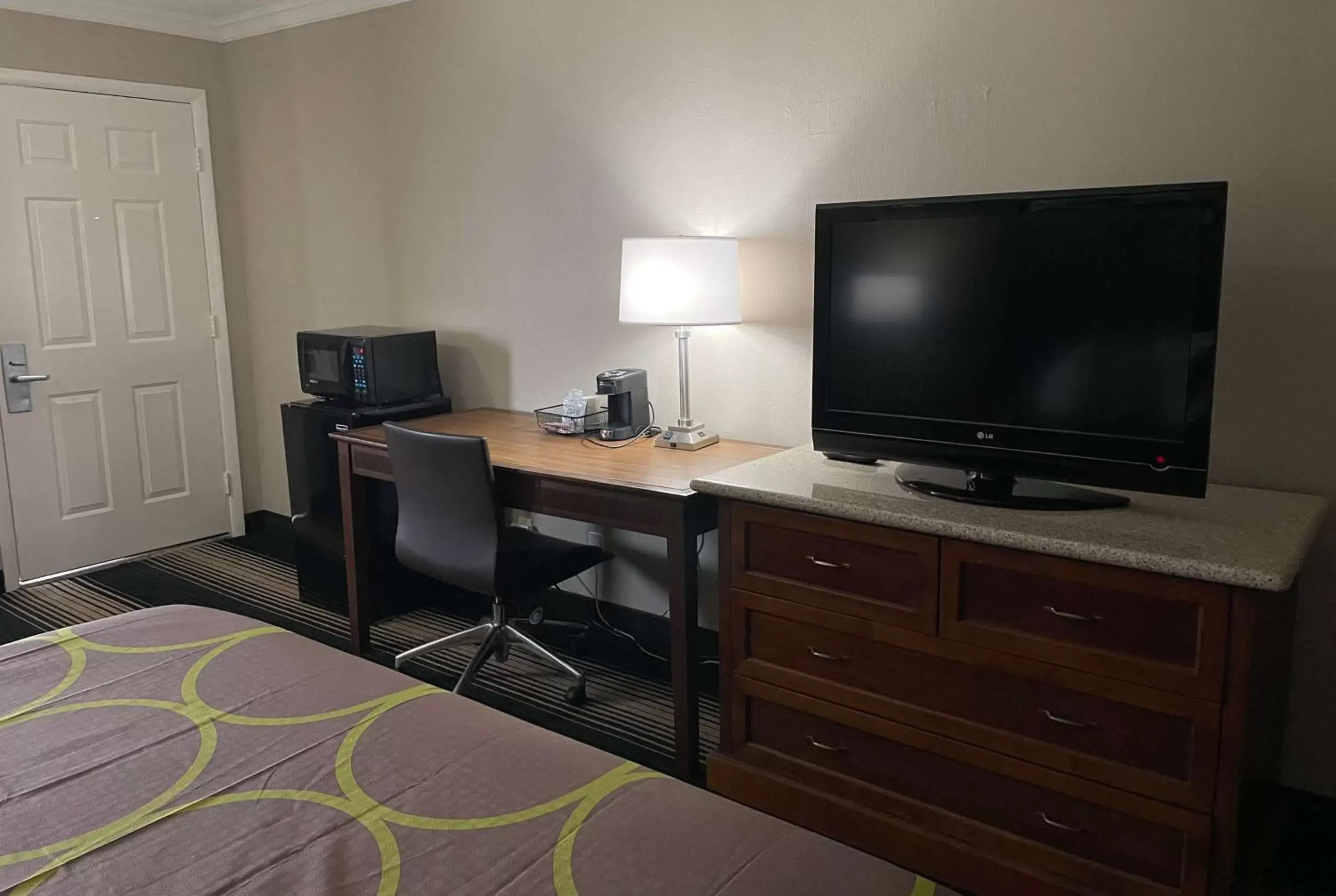 Photo of the whole room, TV/Entertainment Center in Super 8 by Wyndham Junction City