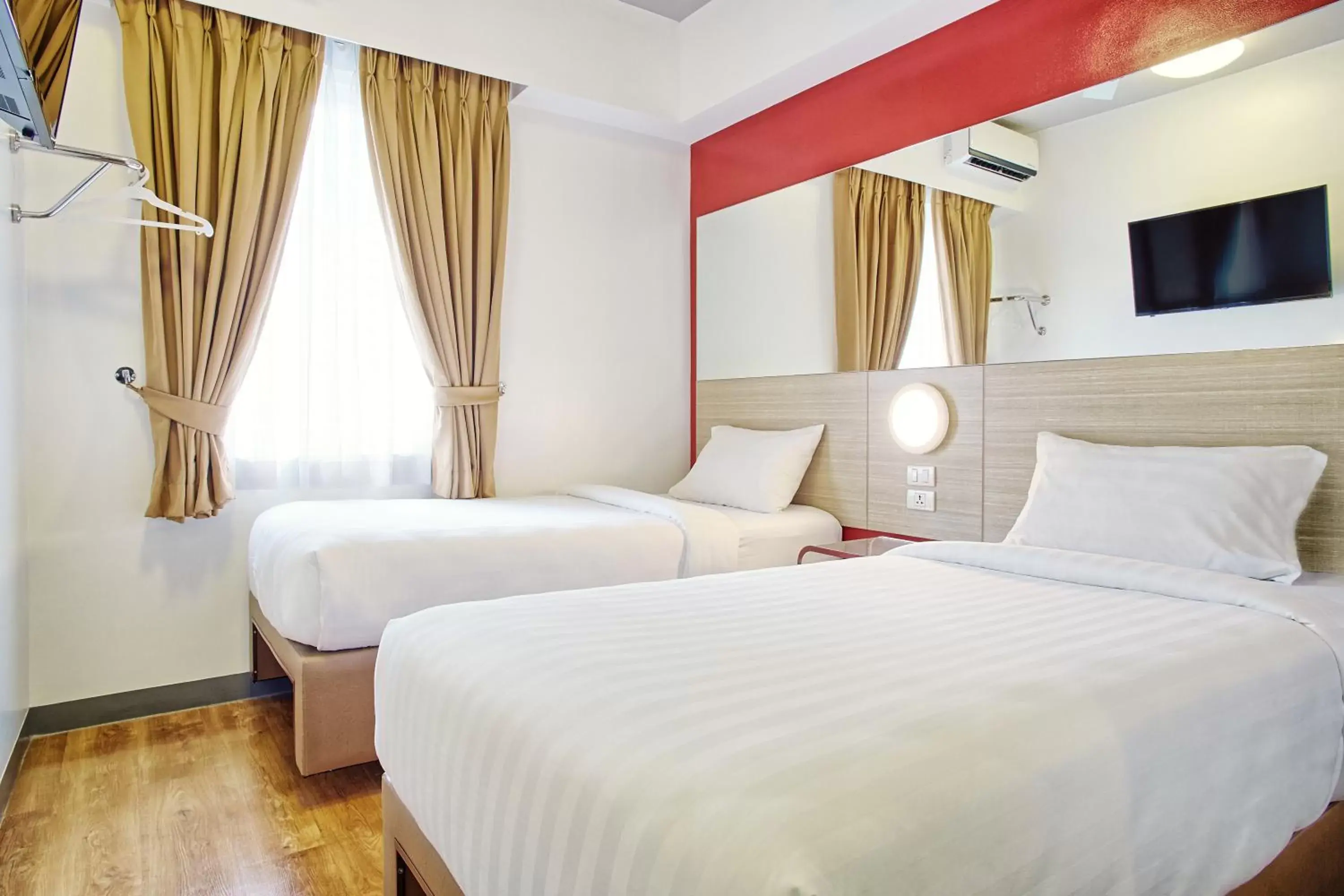 Bed in Red Planet Makati Amorsolo