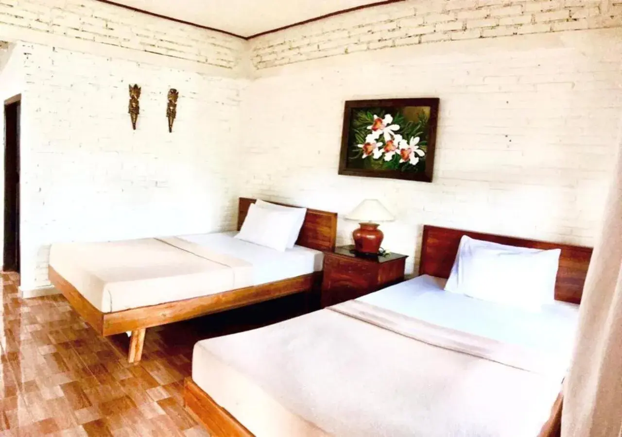 Bed in Pande Permai Bungalows