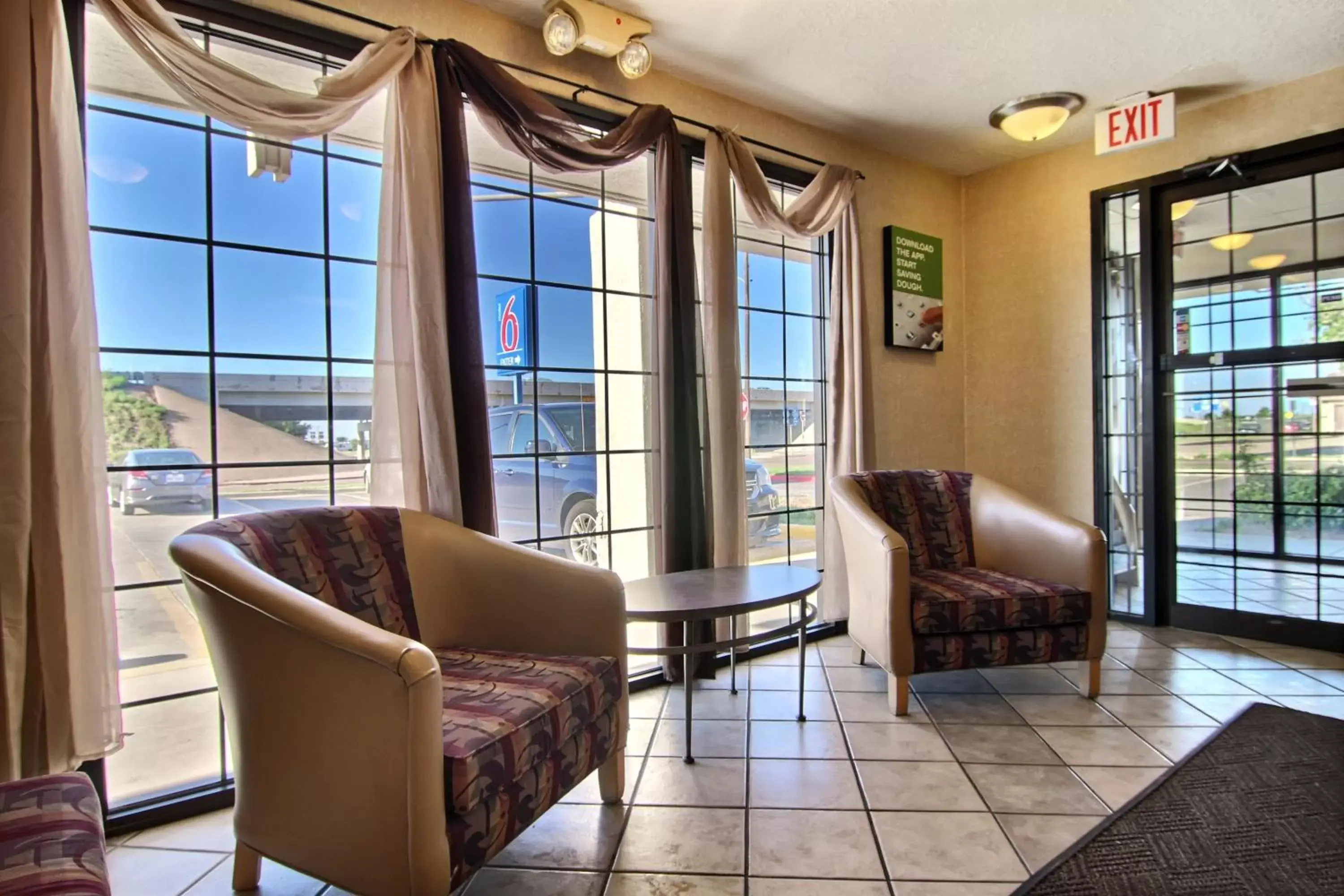 Communal lounge/ TV room, Seating Area in Motel 6-Amarillo, TX - Airport