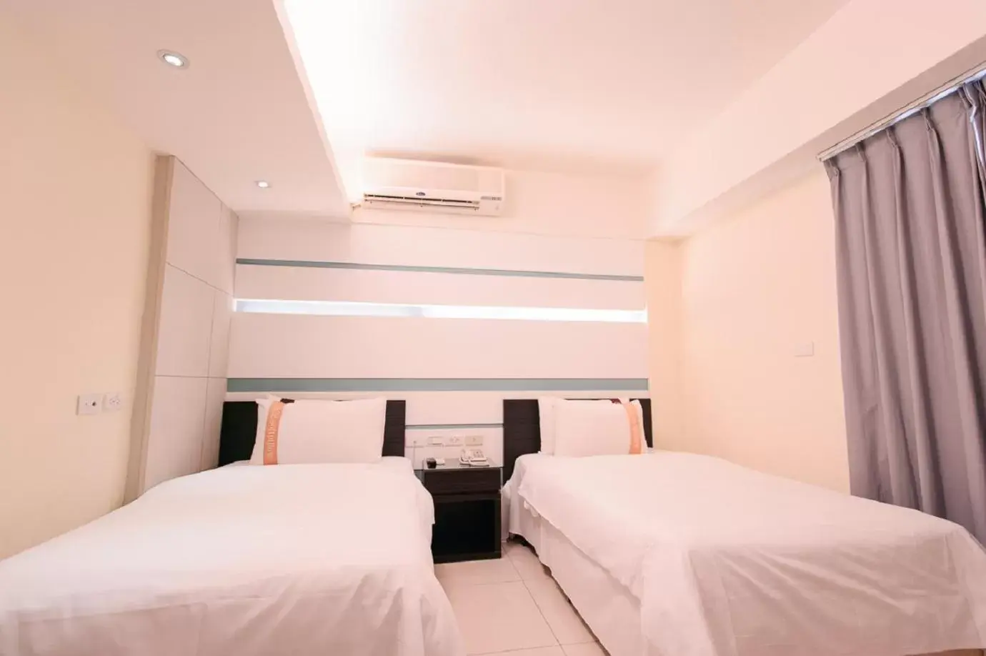 Bed in Kiwi Express Hotel - Kaohsiung Station Bed in Kiwi Express Hotel - Kaohsiung Station