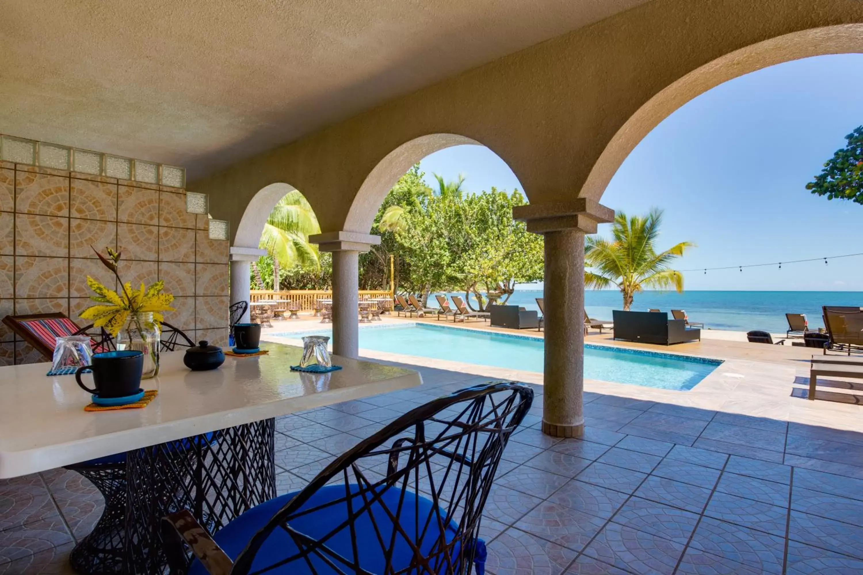 Patio, Swimming Pool in Mariposa Belize Beach Resort