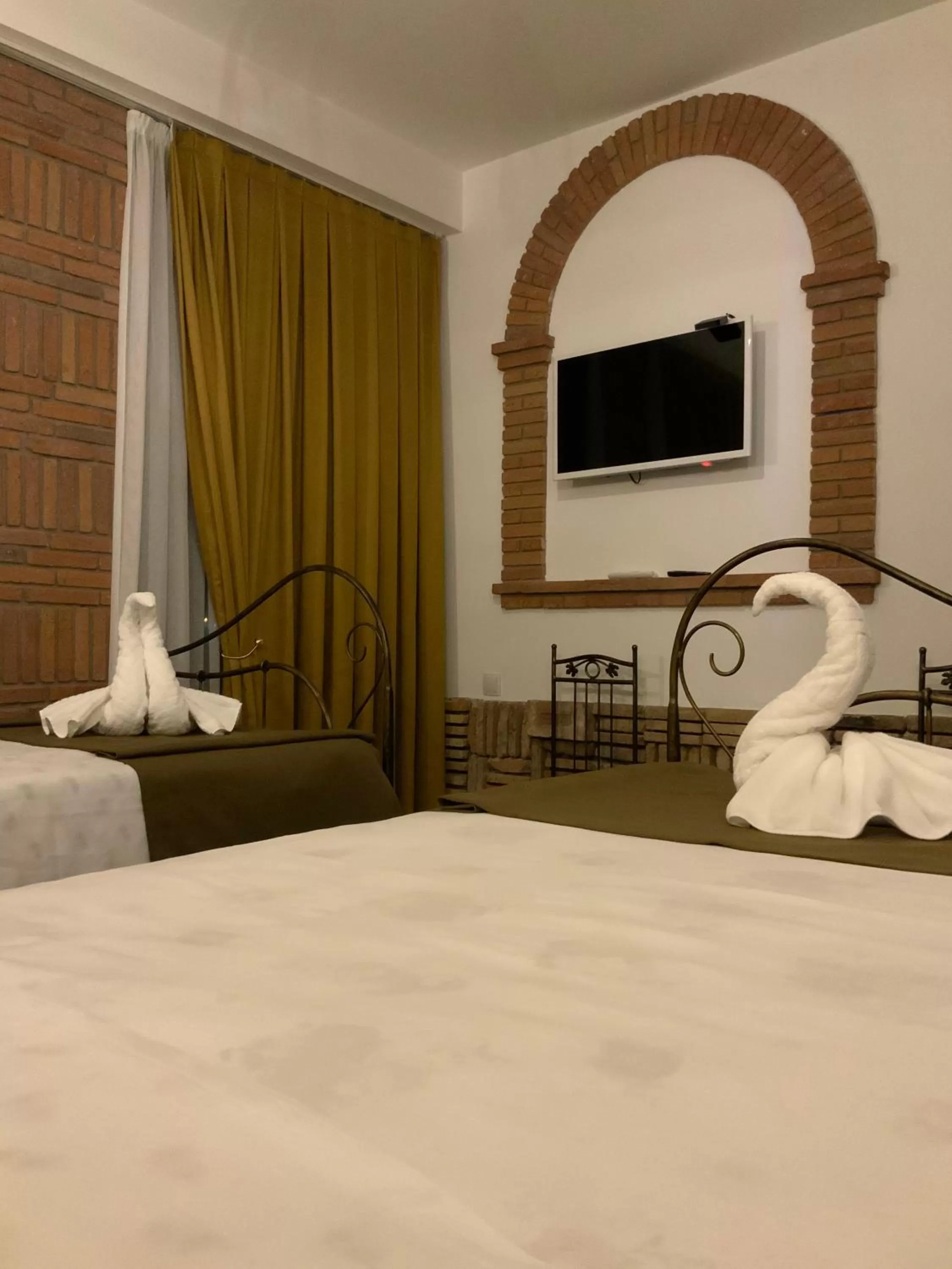 Bed in Janashia Boutique Hotels