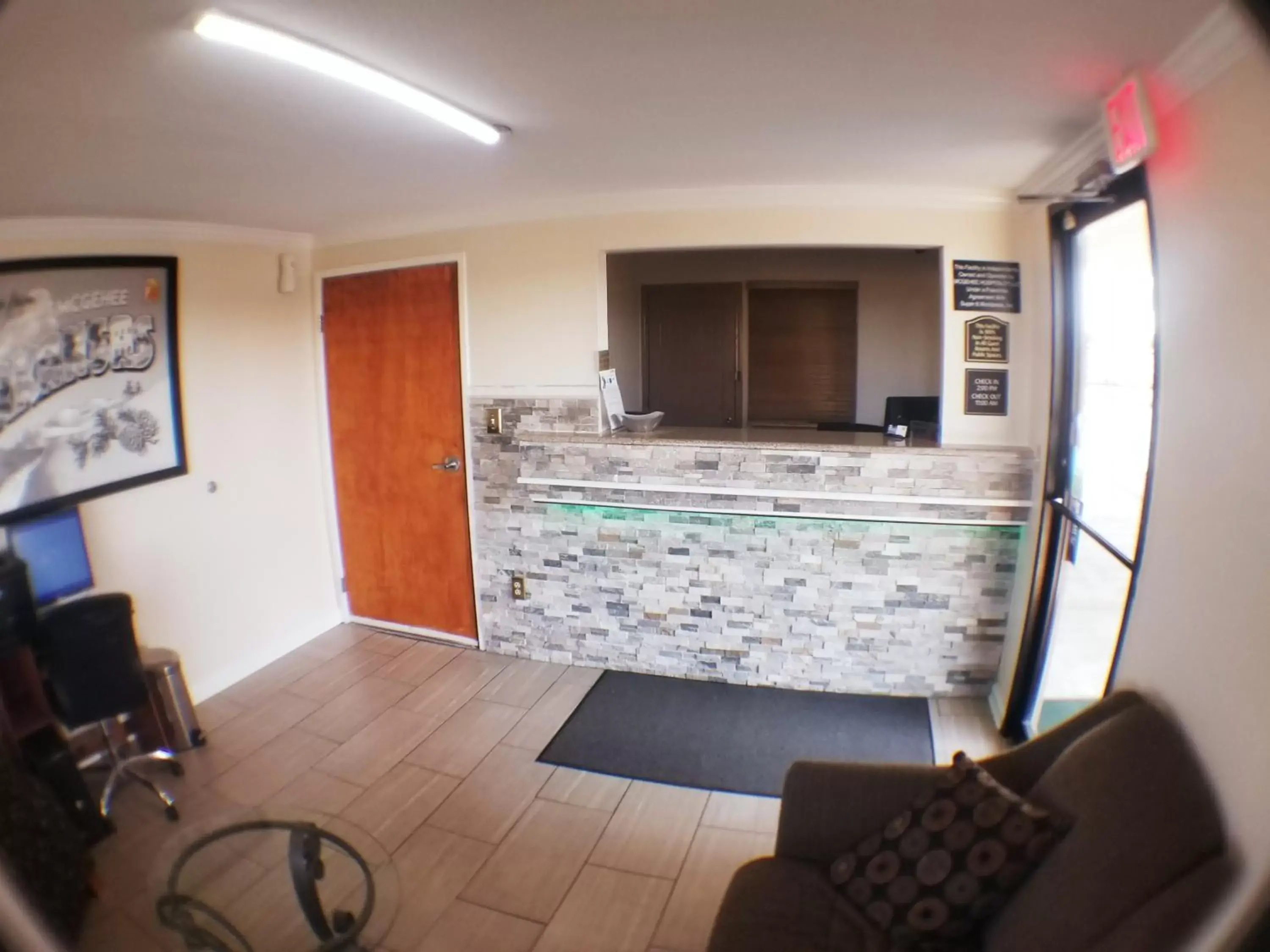 Lobby or reception in Super 8 by Wyndham McGehee Lobby or reception in Super 8 by Wyndham McGehee