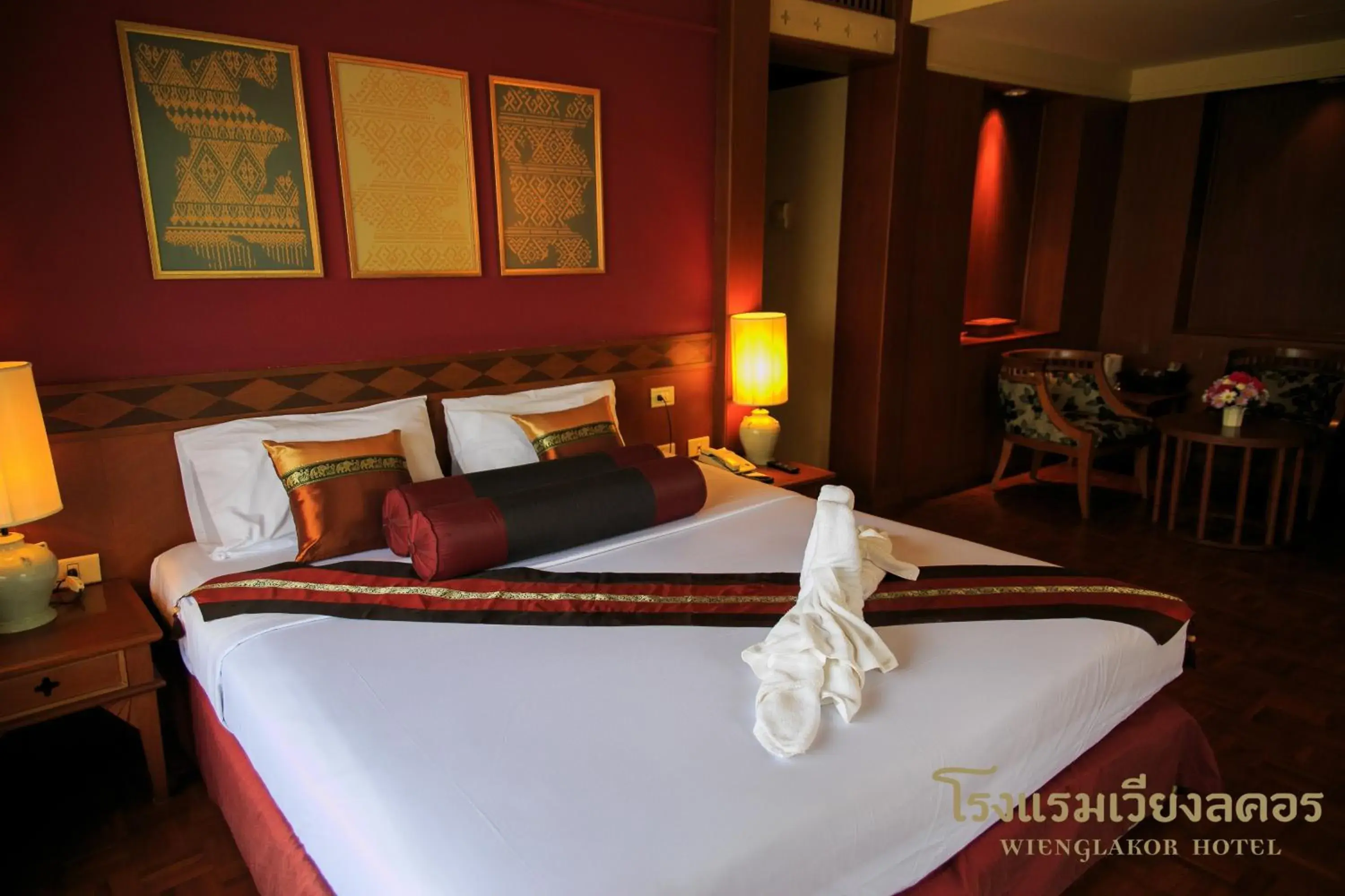 Photo of the whole room, Bed in Wienglakor Hotel (SHA Extra Plus)