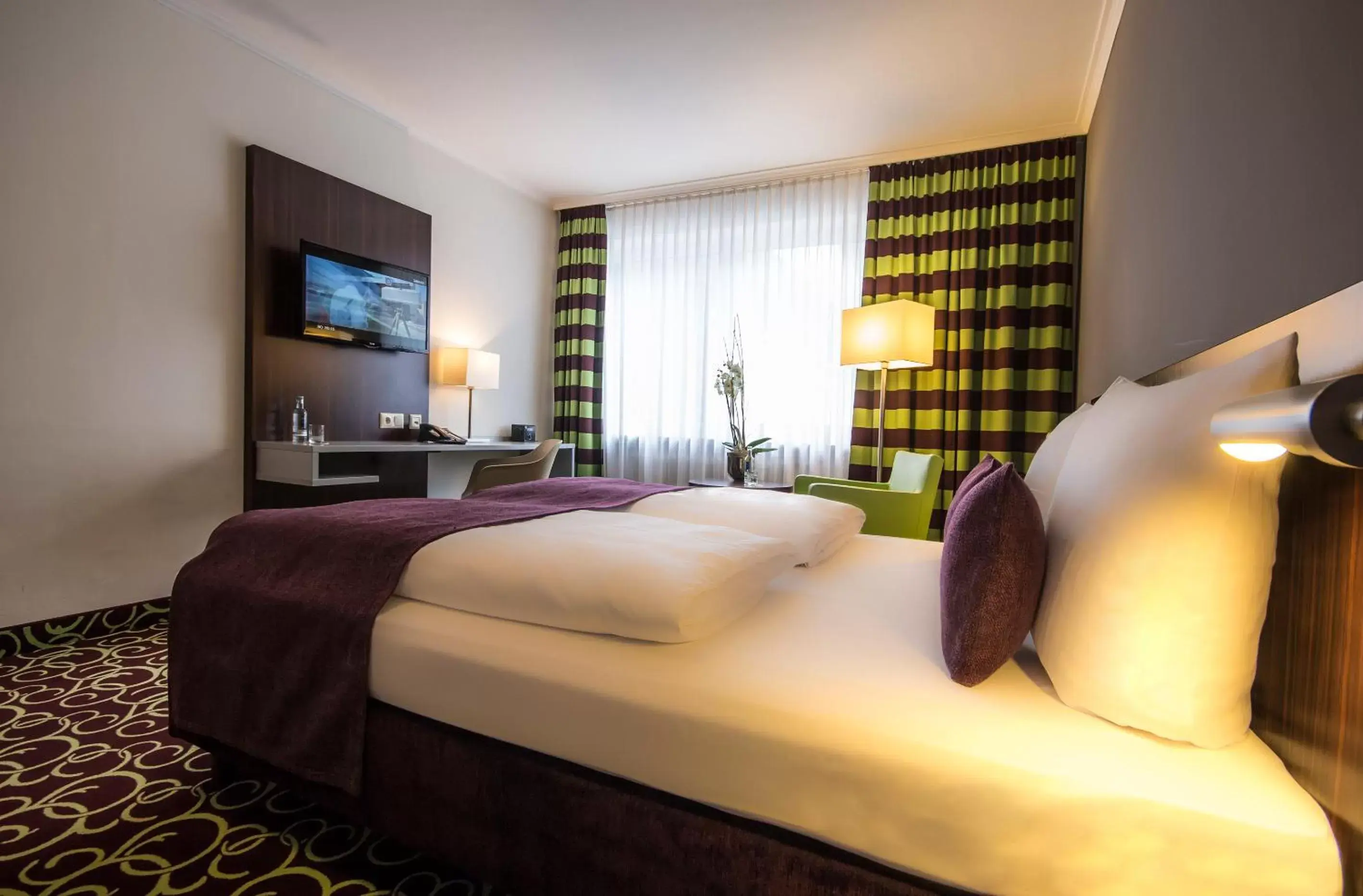 Bed in Hotel Metropol by Maier Privathotels