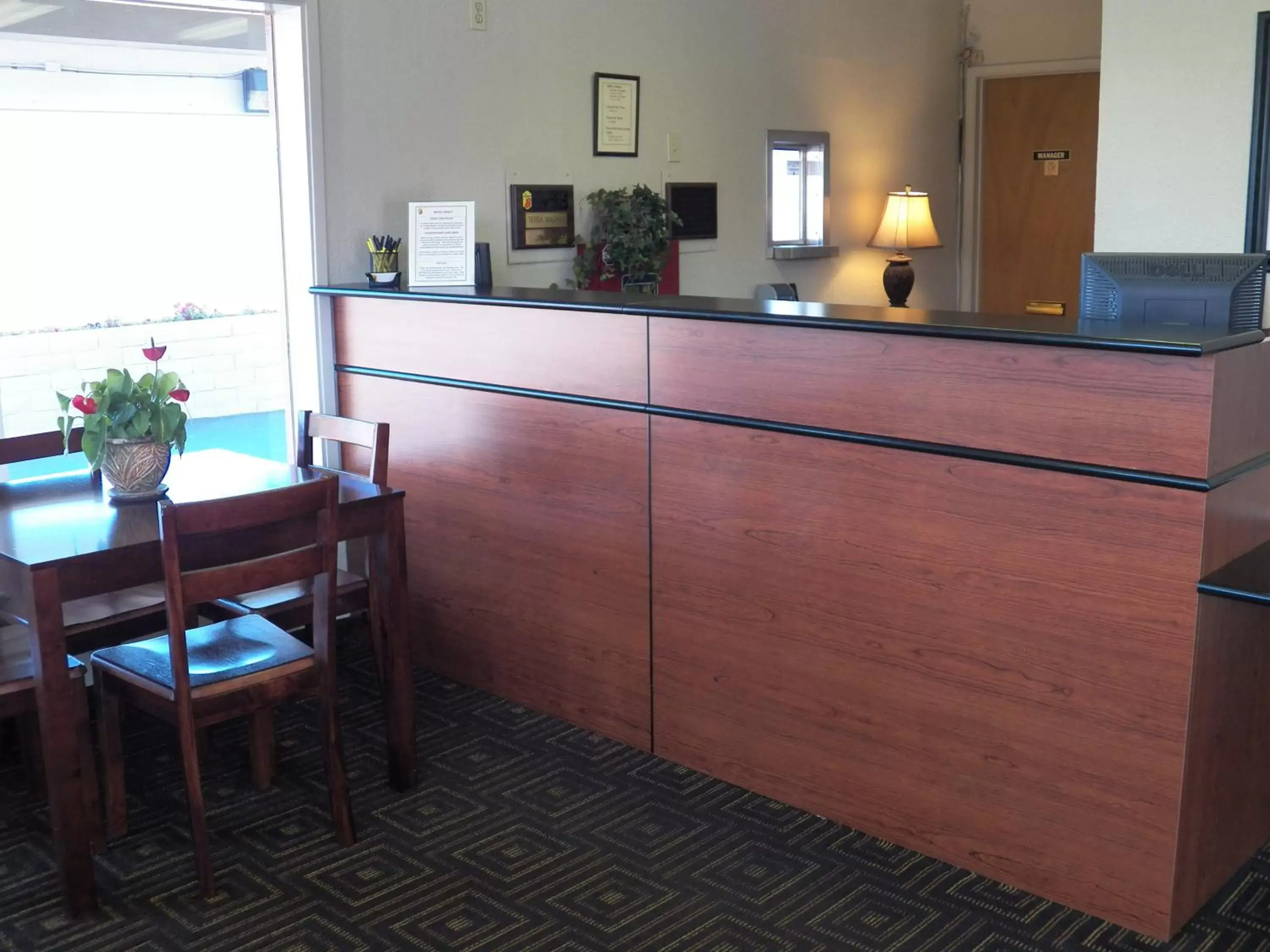 Lobby or reception in Super 8 by Wyndham Fort Bragg