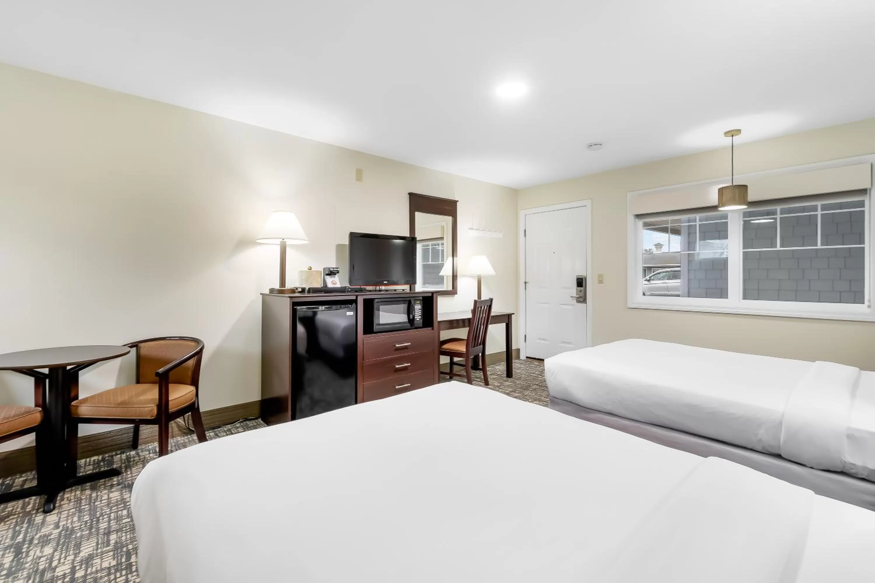 Bed in Top Notch Inn