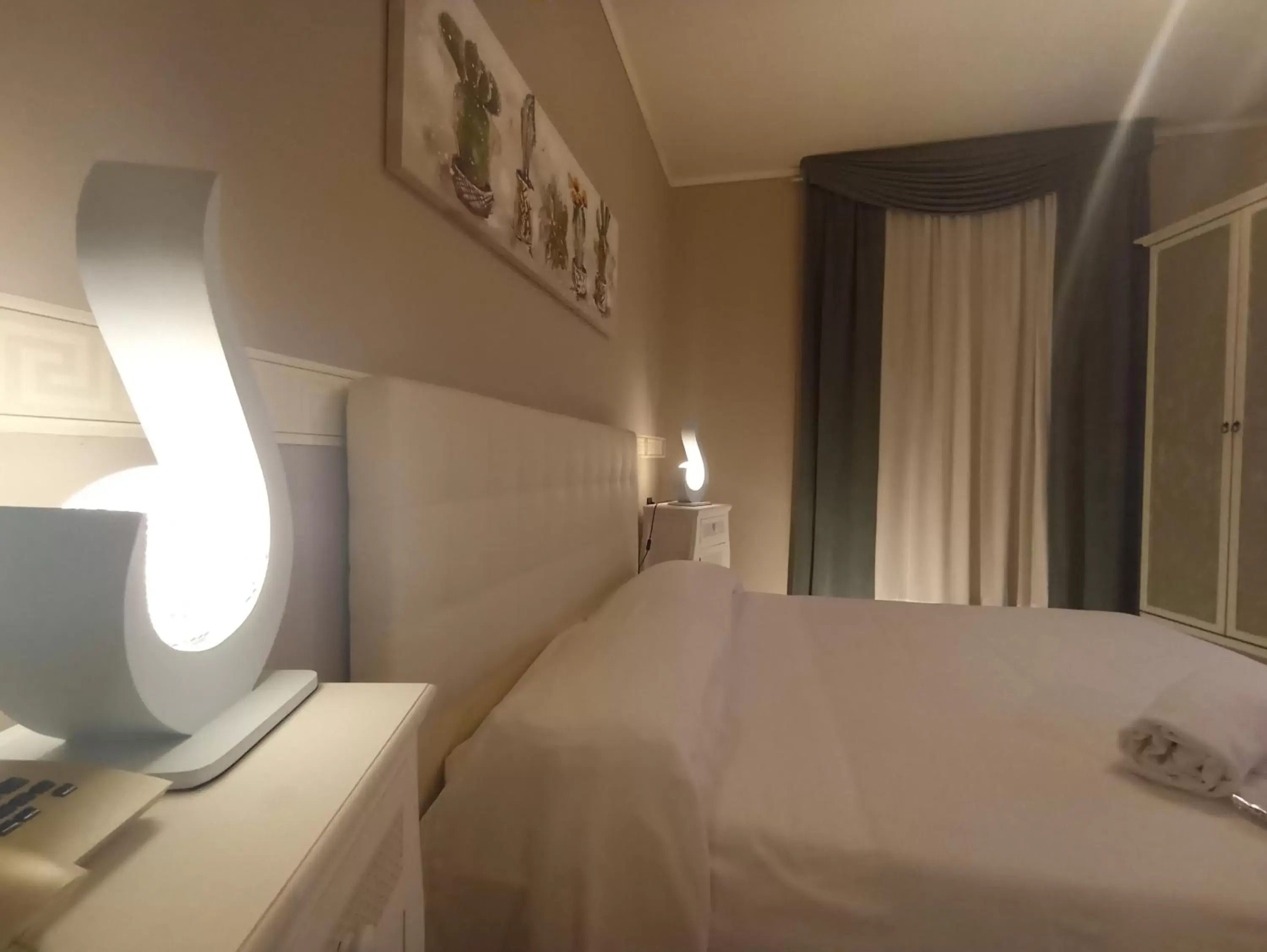 Bed in Hotel Palladium