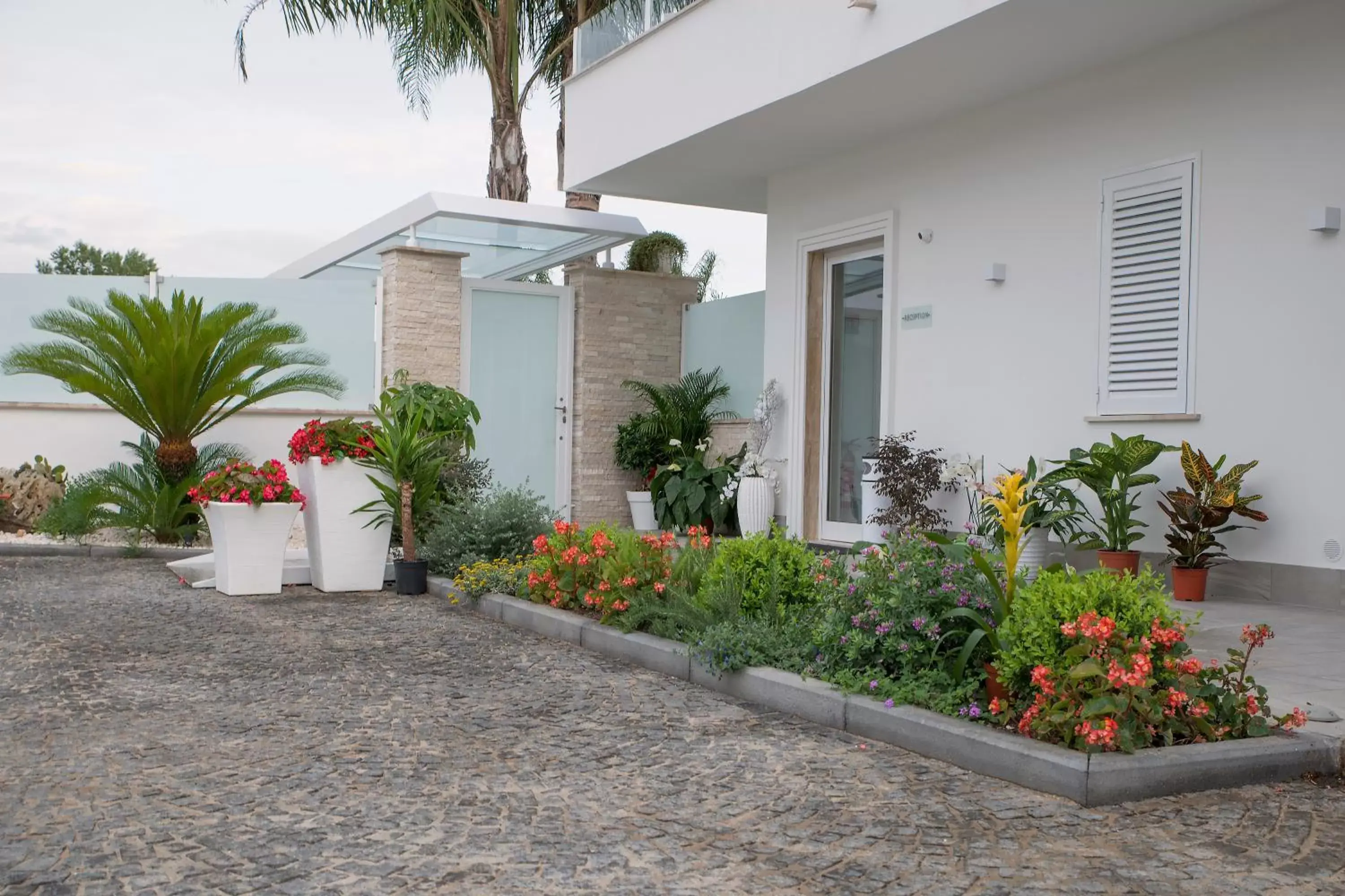 Facade/entrance, Patio/Outdoor Area in Hotel America