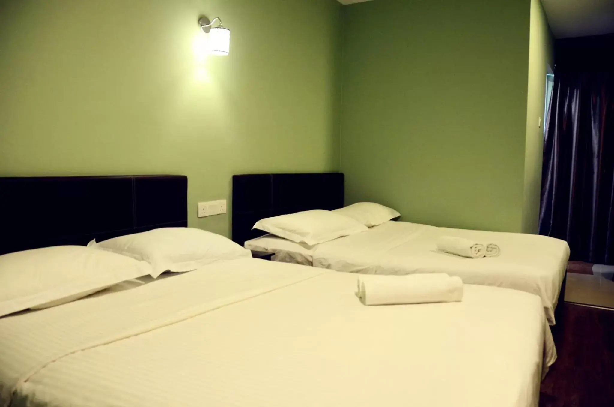 Bed in Hotel Sri Rembia