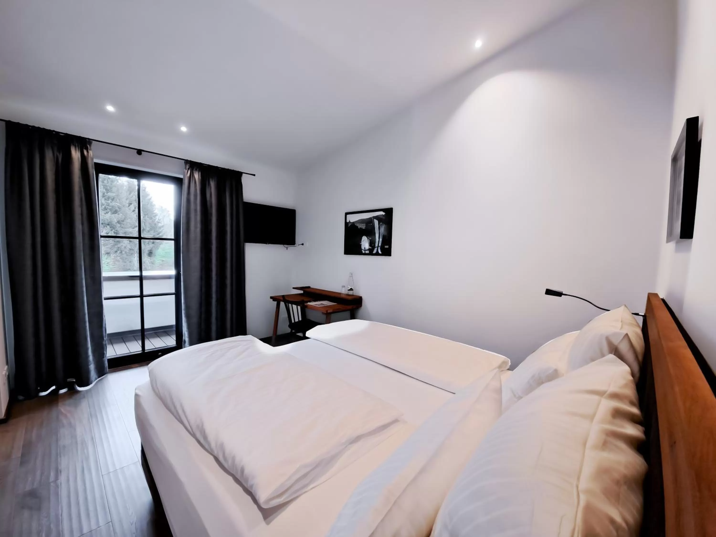 Bed in MotelplusHotel BiggeSeeFront