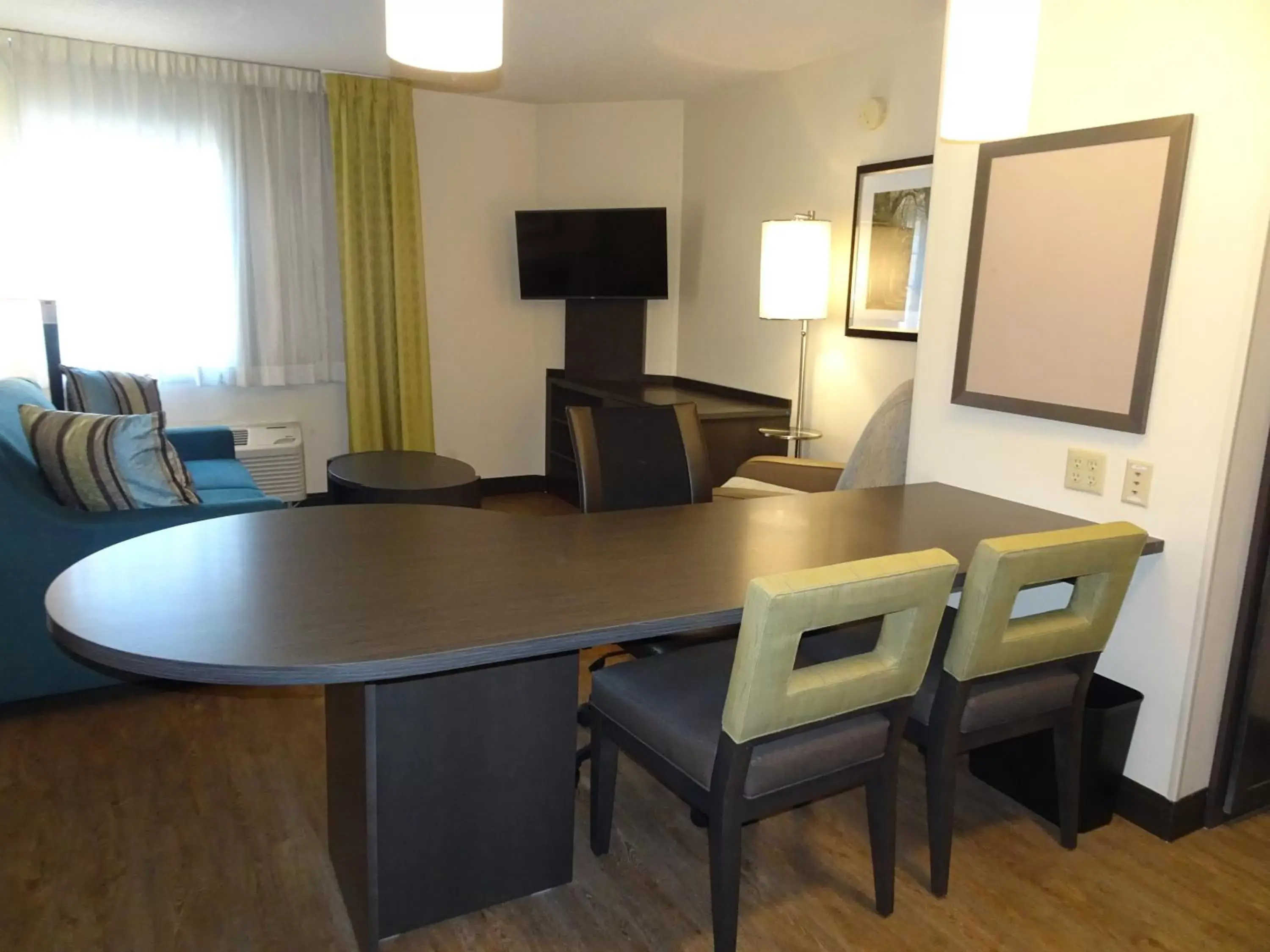 Photo of the whole room, TV/Entertainment Center in Candlewood Suites Richmond West End Short Pump, an IHG Hotel