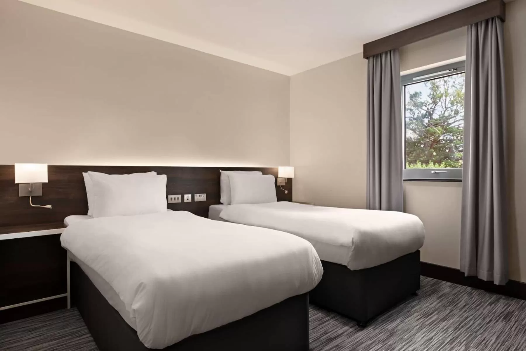 Bed in Ramada by Wyndham Cobham