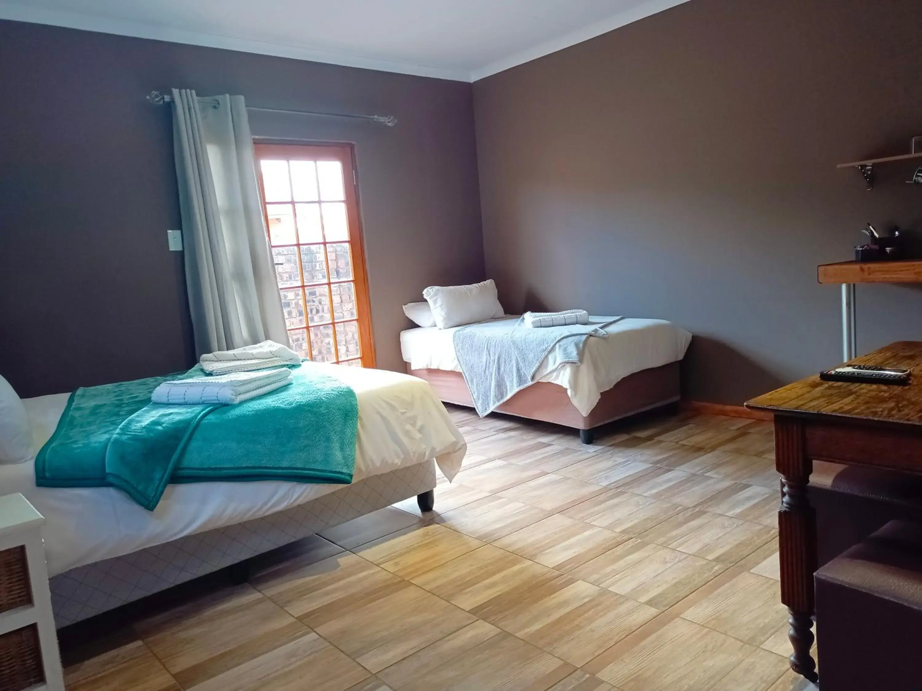Photo of the whole room, Bed in 21 On Coetzee Guest House