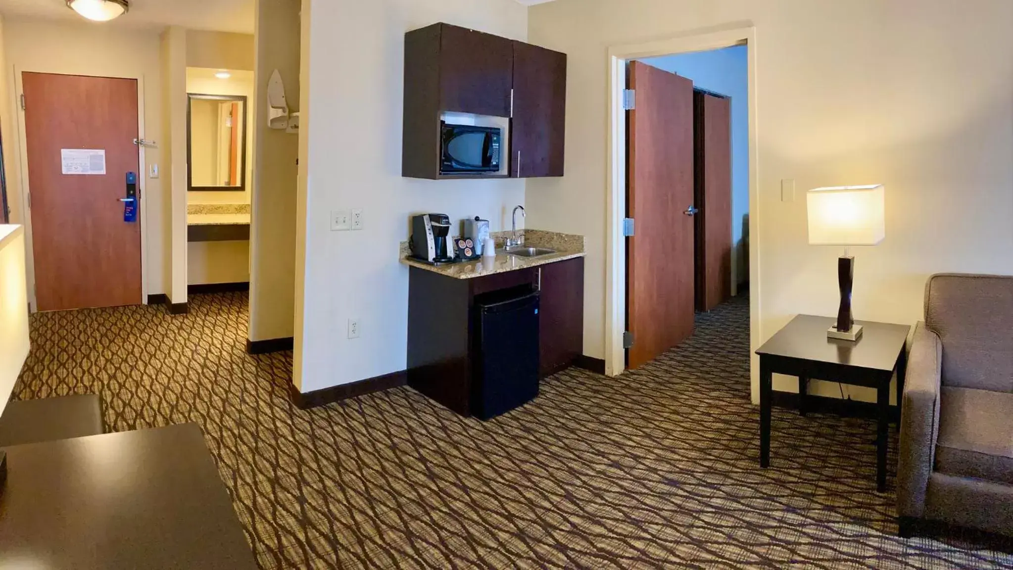 Photo of the whole room, TV/Entertainment Center in Holiday Inn Express Hotel & Suites Edmond, an IHG Hotel