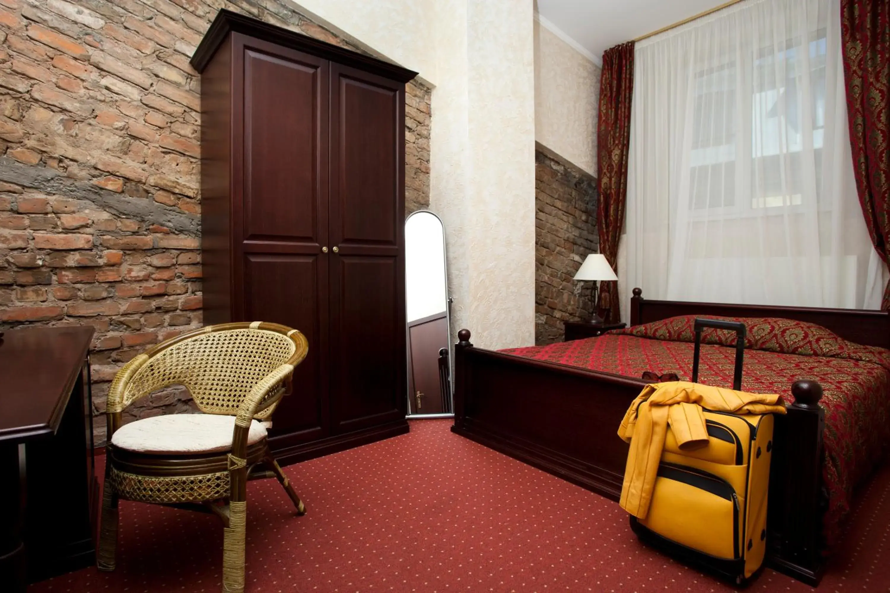 Bed, Seating Area in Boutique Hotel Monte Kristo
