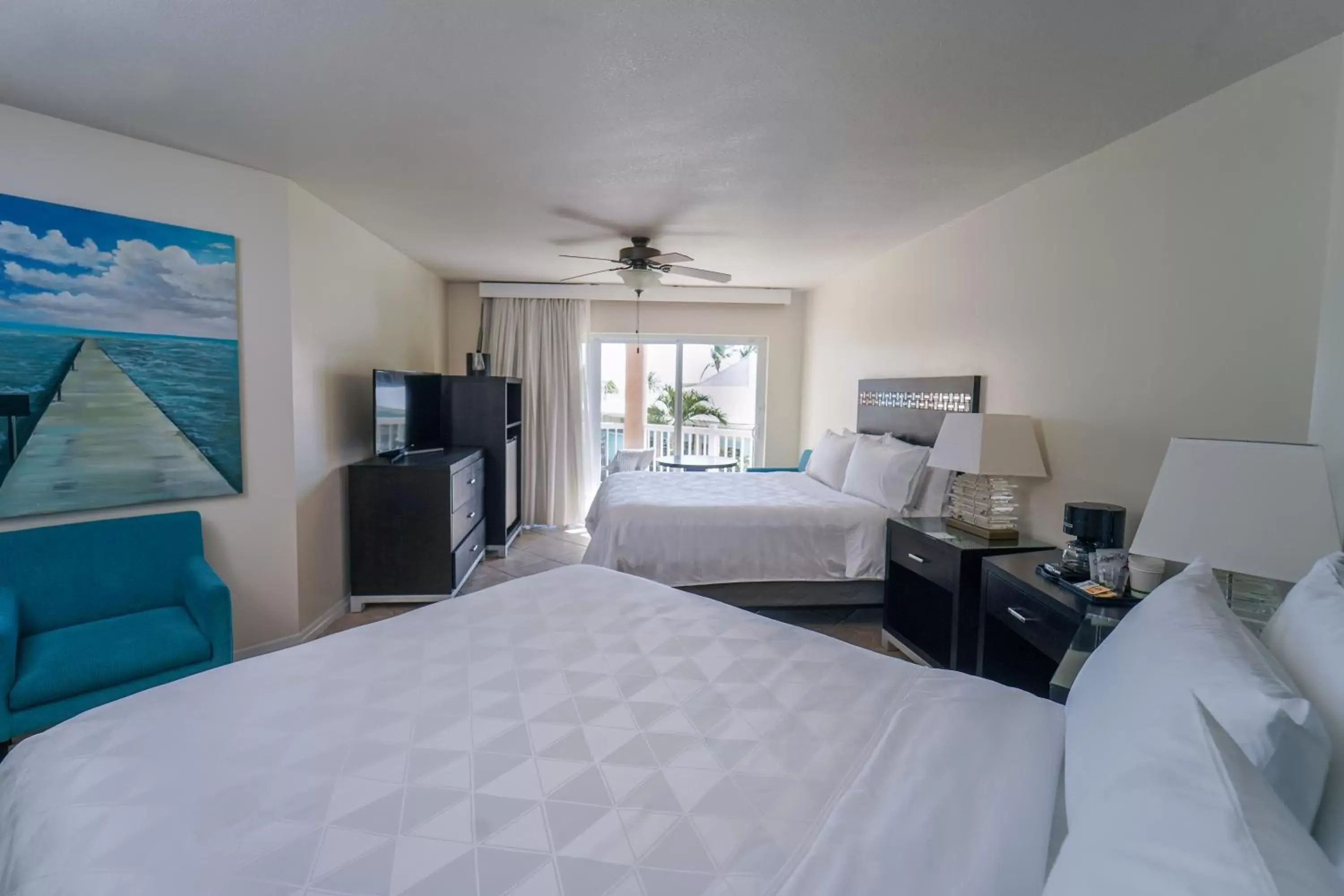 Bedroom in Holiday Inn Resort Grand Cayman, an IHG Hotel