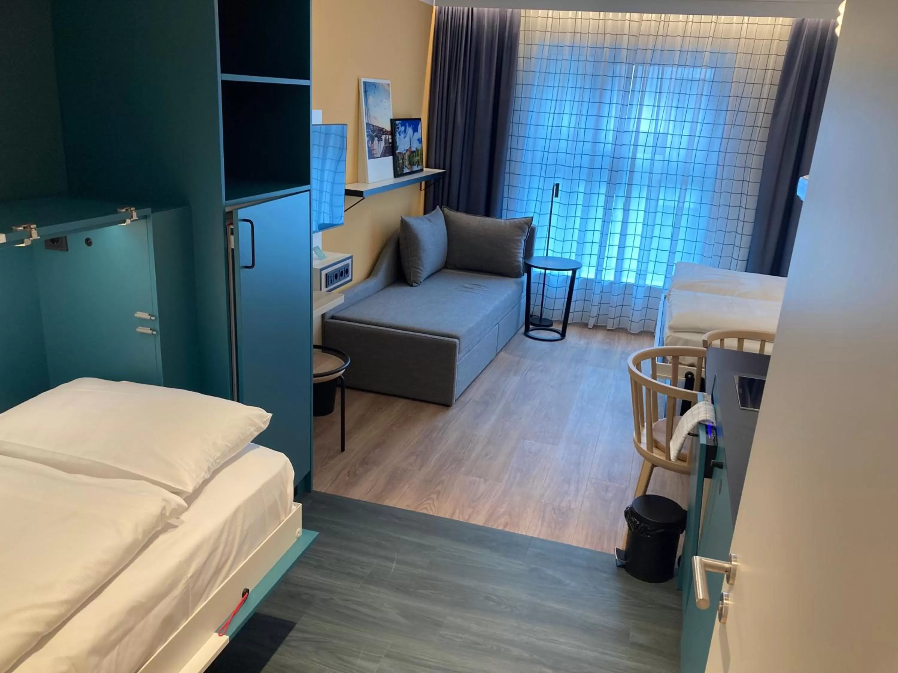 Living room, Bed in Aparthotel Adagio access Hamburg