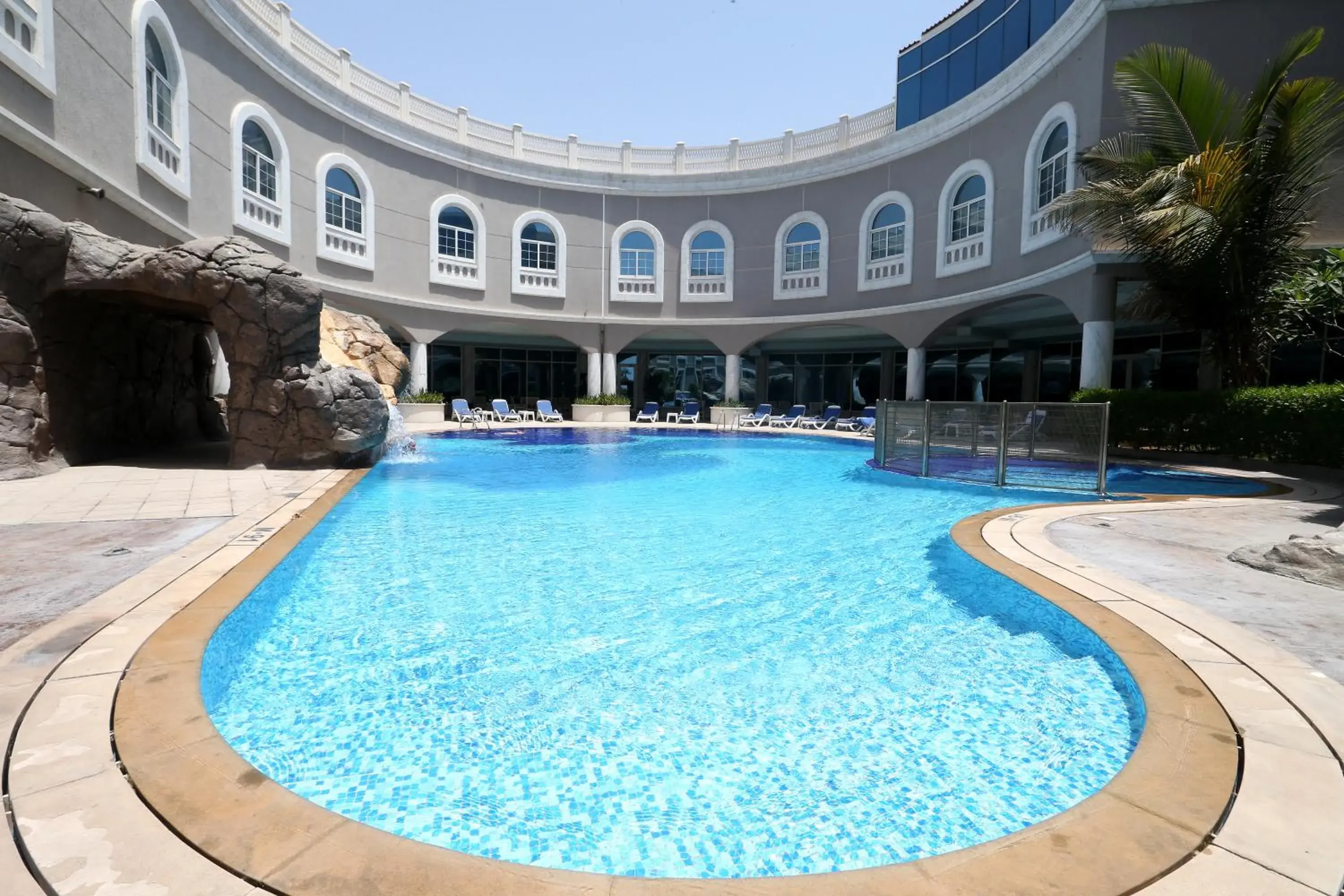 Swimming pool, Property Building in Sharjah Premiere Hotel & Resort