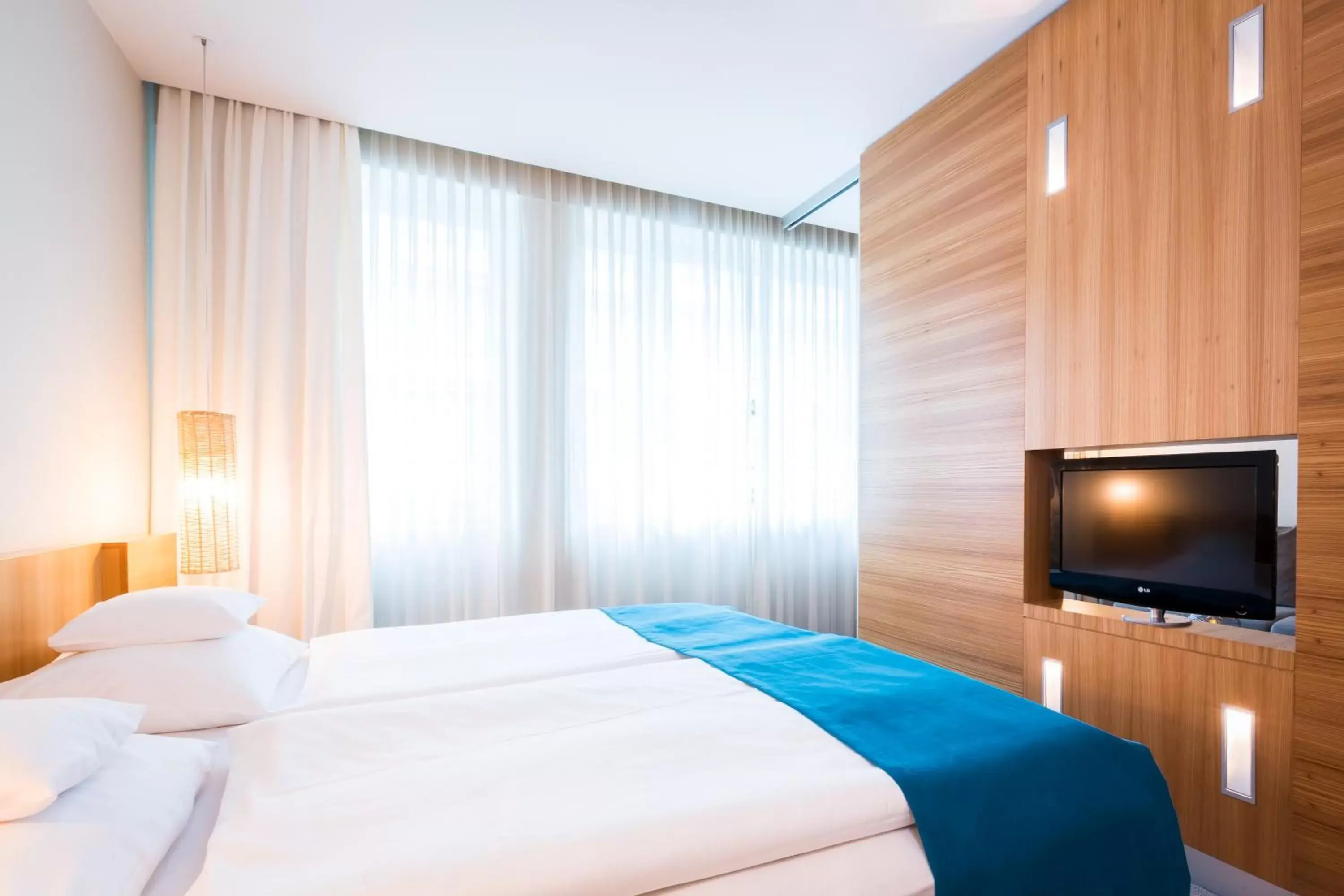 Photo of the whole room, Bed in Lindner Hotel Berlin Ku'damm, part of JdV by Hyatt