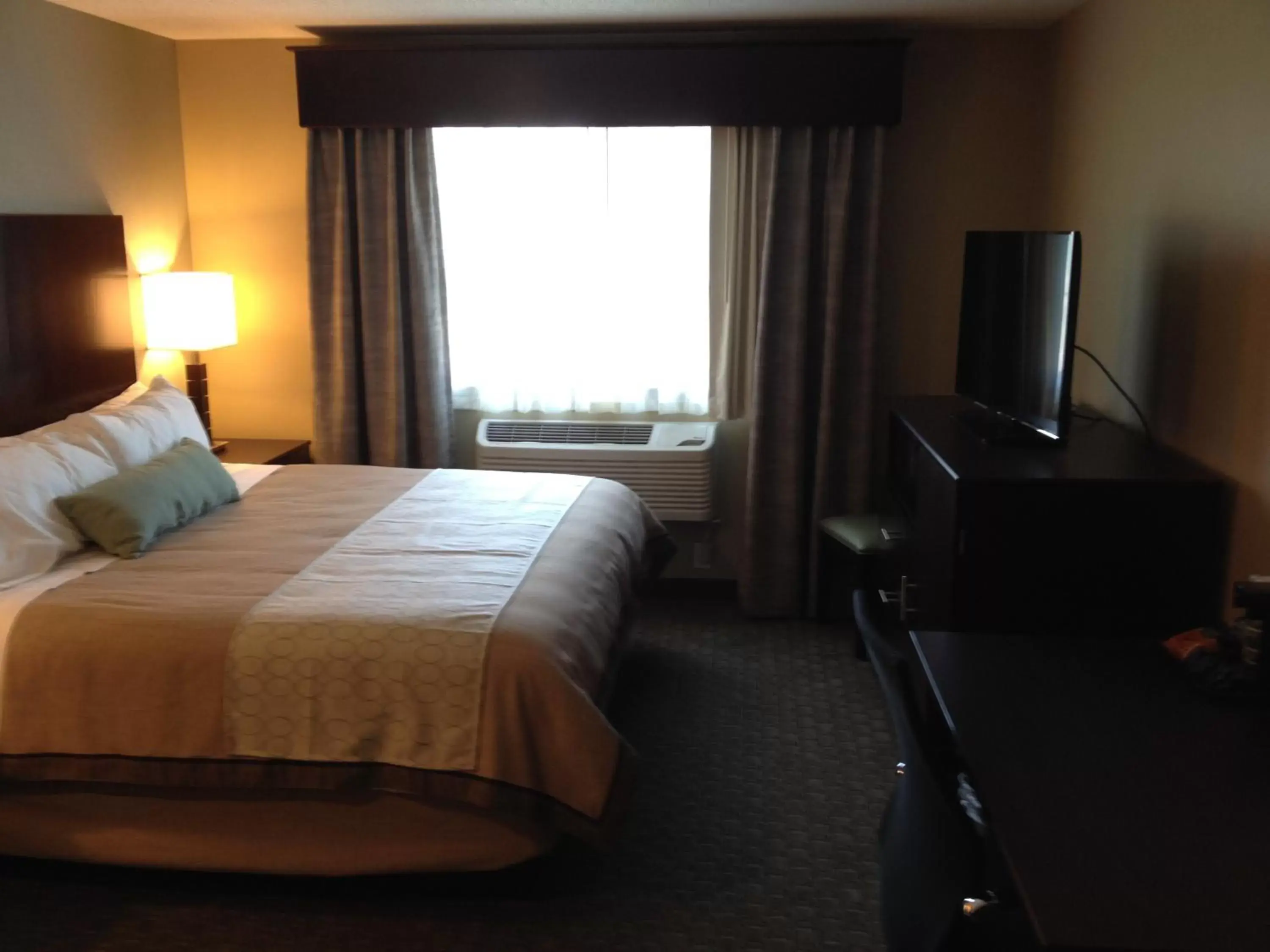 Bed in GrandStay Hotel & Suites - Glenwood