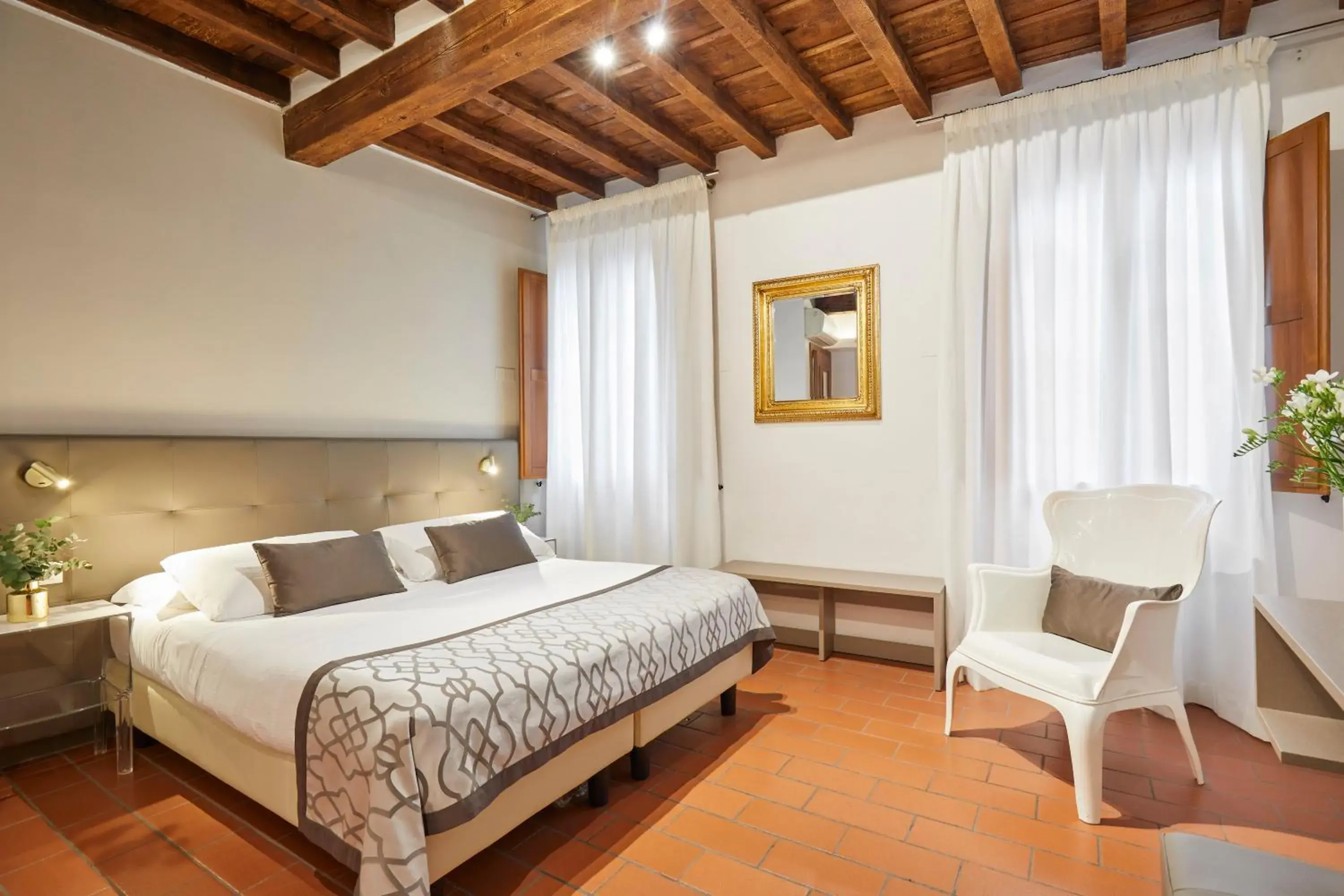 Bed in Sette Angeli Rooms