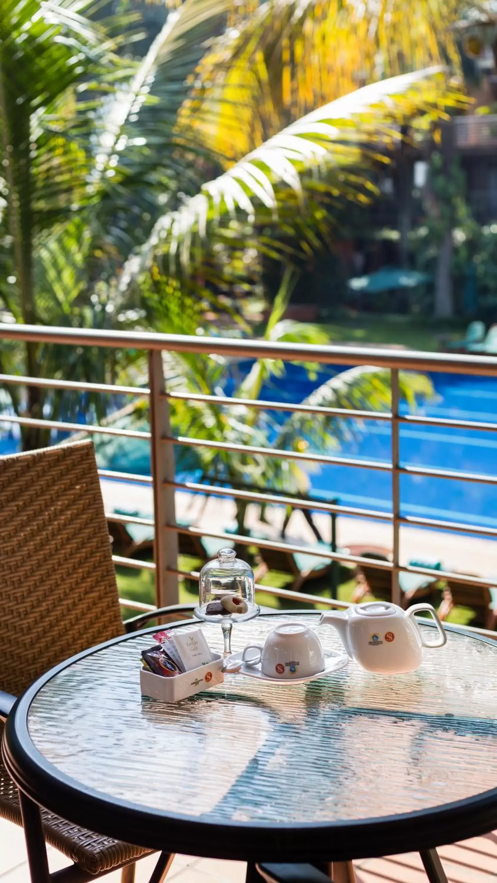 Balcony/Terrace, Pool View in Kabira Country Club