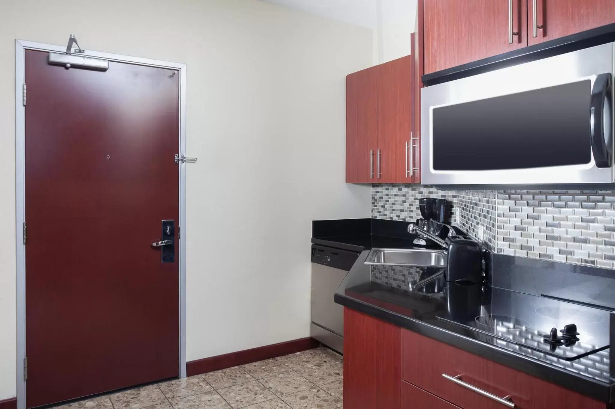 Photo of the whole room, Kitchen/Kitchenette in Staybridge Suites Las Vegas - Stadium District