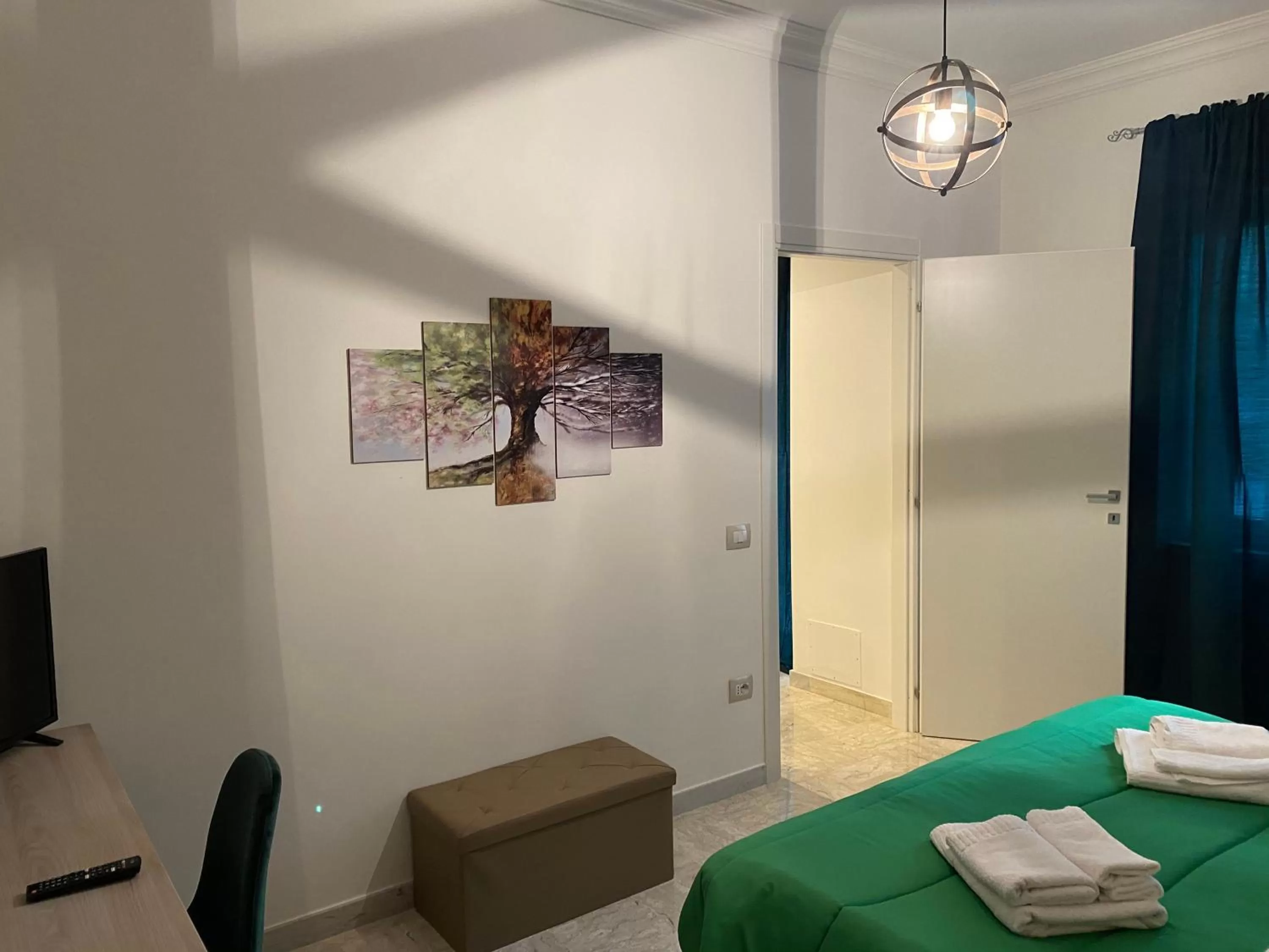 Bedroom, Seating Area in Suite in Città residence